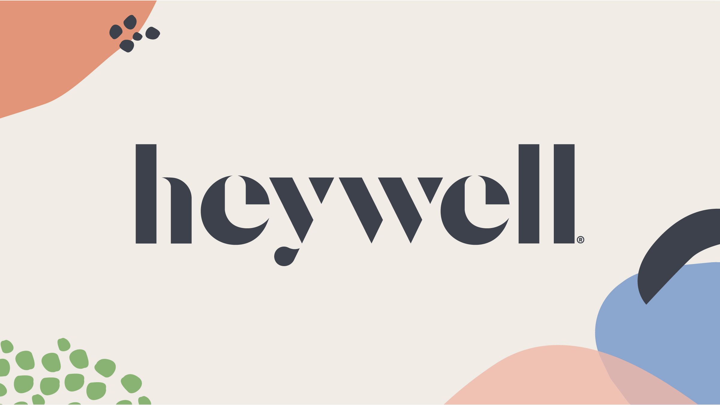 Abstract colorful shapes with the text 'heywell' in the center.