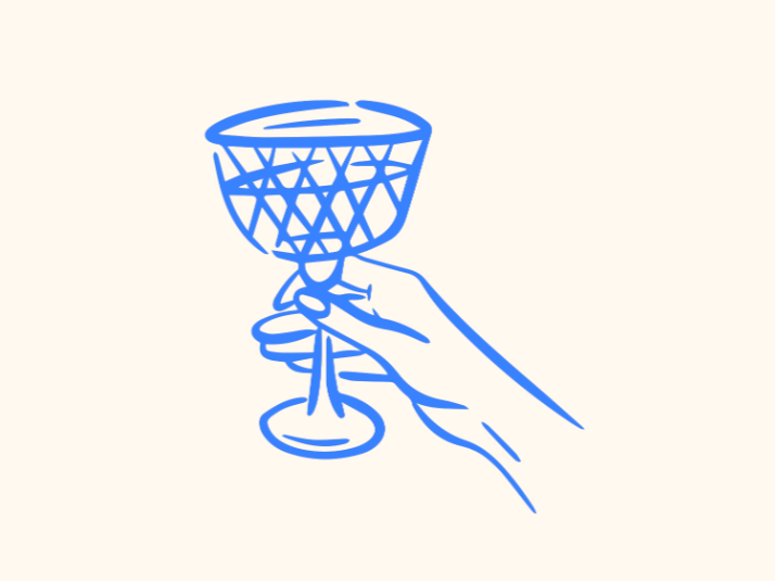 Line drawing of a hand holding a decorated wine glass.