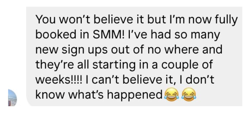 Screenshot of a text message expressing surprise about being fully booked in social media marketing, with multiple new signs and disbelief, ending with laughing emojis.
