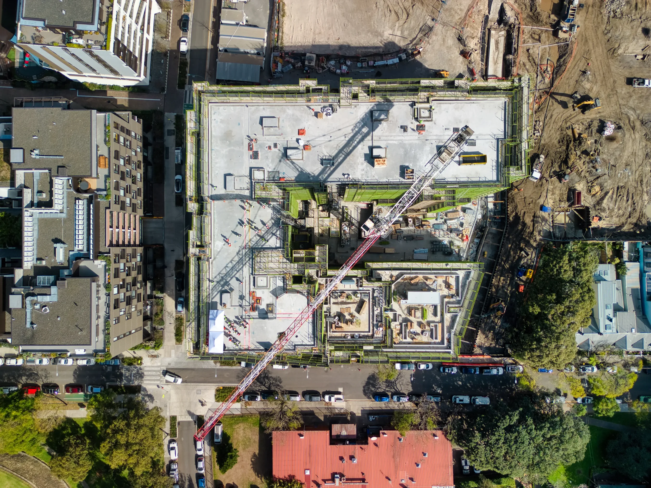 Drone aerial view of construction crane topping out in Sydney