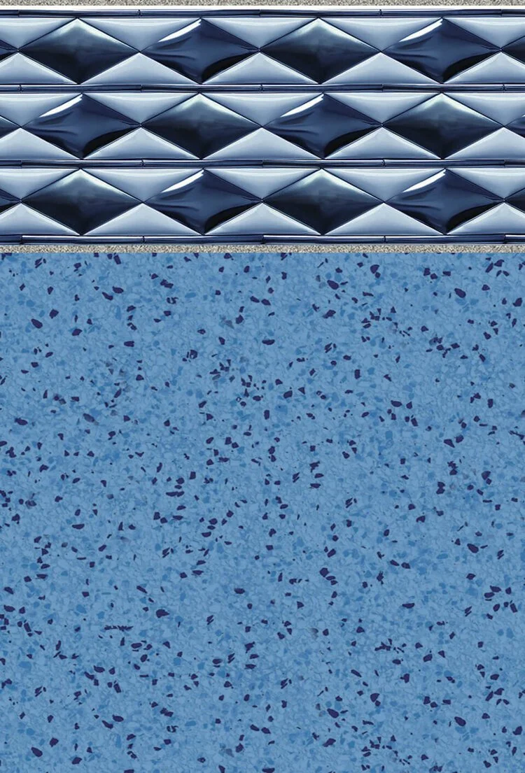 Close-up of a section of a pool with blue speckled tiles and a metallic decorative border.