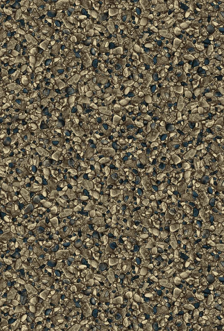 Close-up of a gravel sidewalk with small rocks and pebbles.