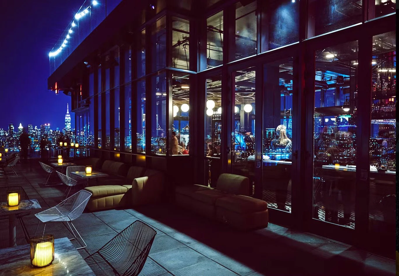 Night view at Westlight restaurant with NYC skyline in background