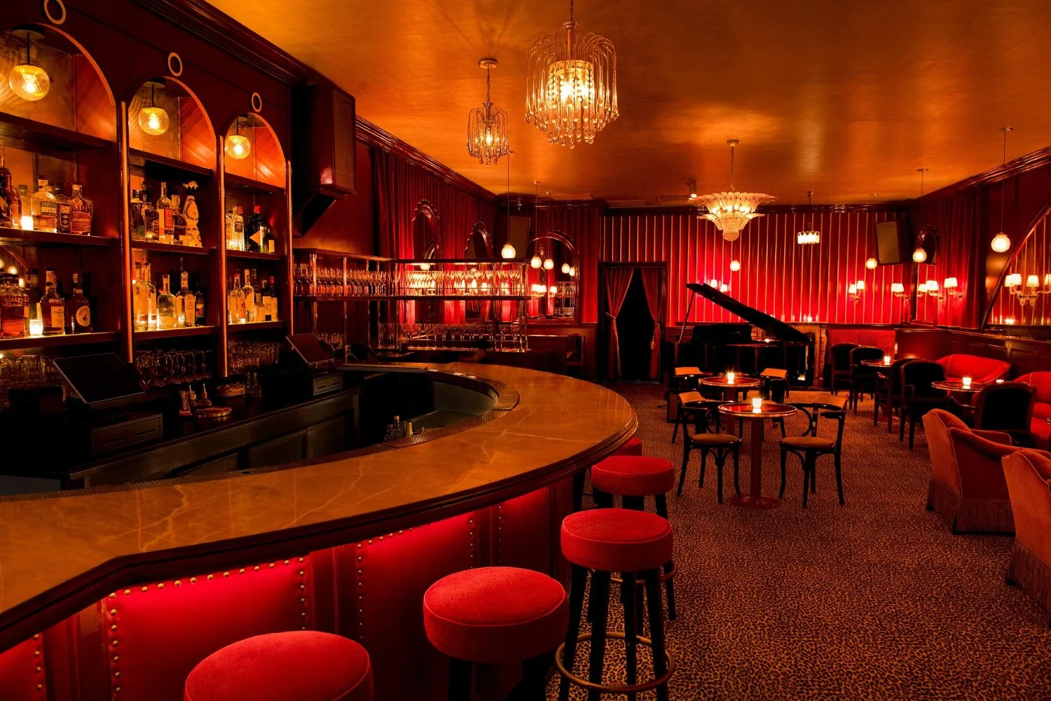 Elegant private lounge in Manhattan with warm lighting and upscale seating, representing a refined evening experience