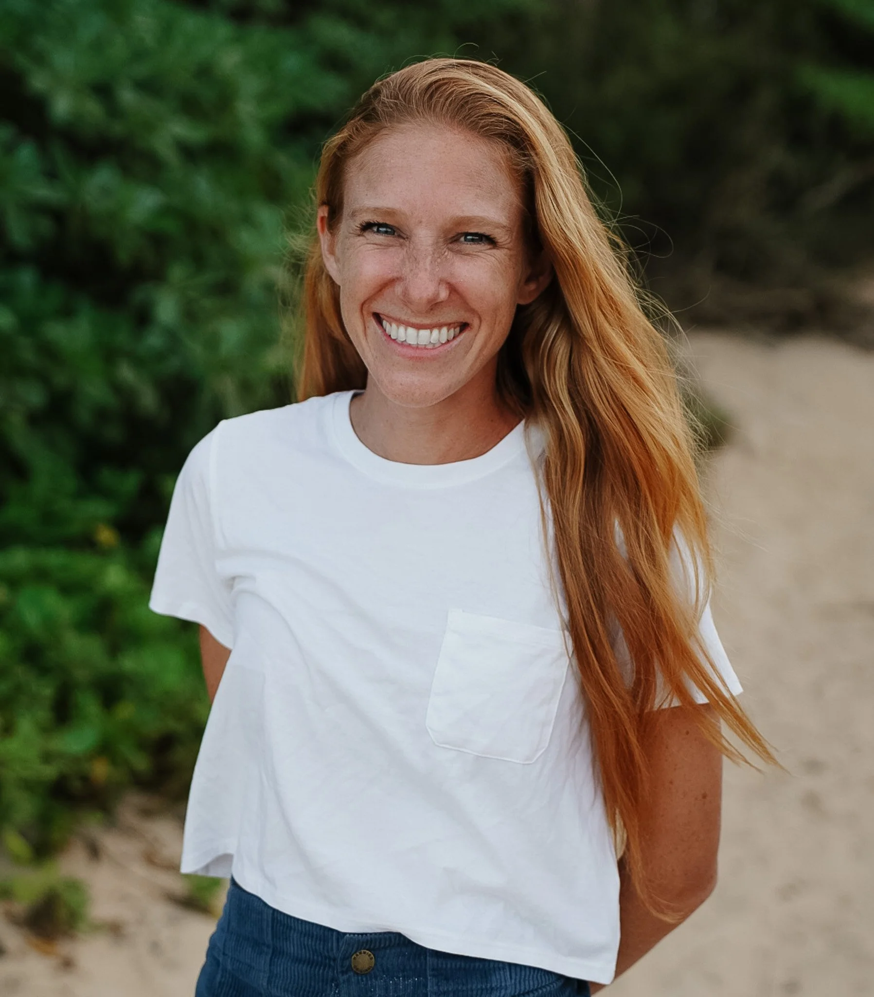 women by beach in fitness
