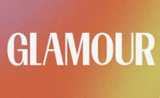 The word 'Glamour' in large white font on a red to yellow gradient background.