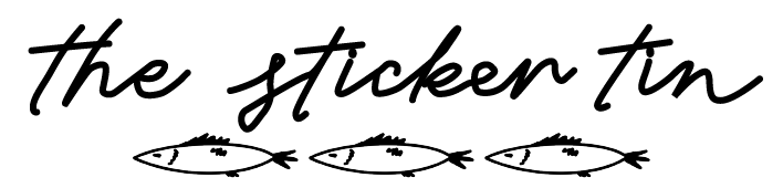 Three fish-shaped paper cutouts with measuring lines.