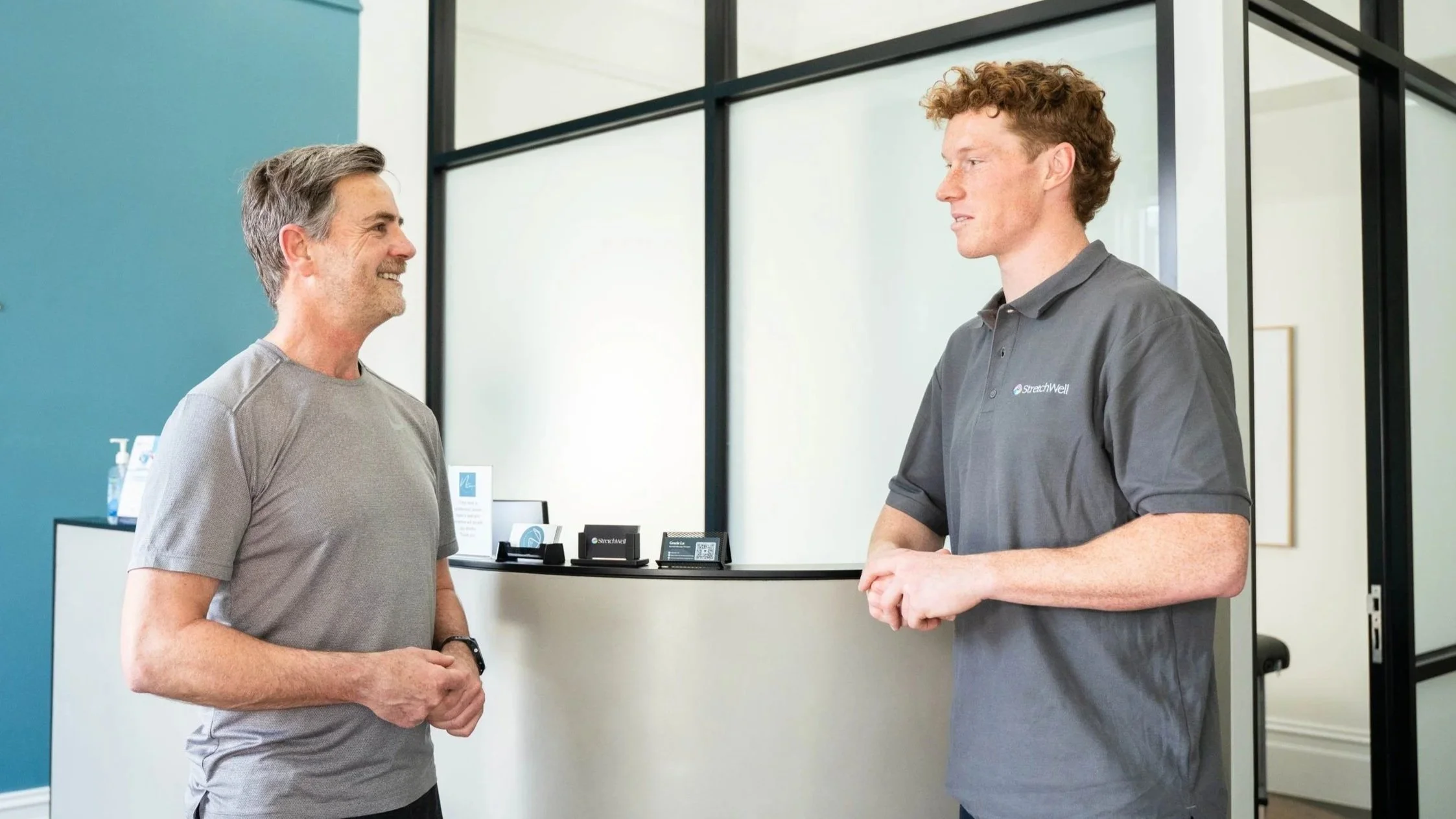 Stretch Therapist Chatting with Client