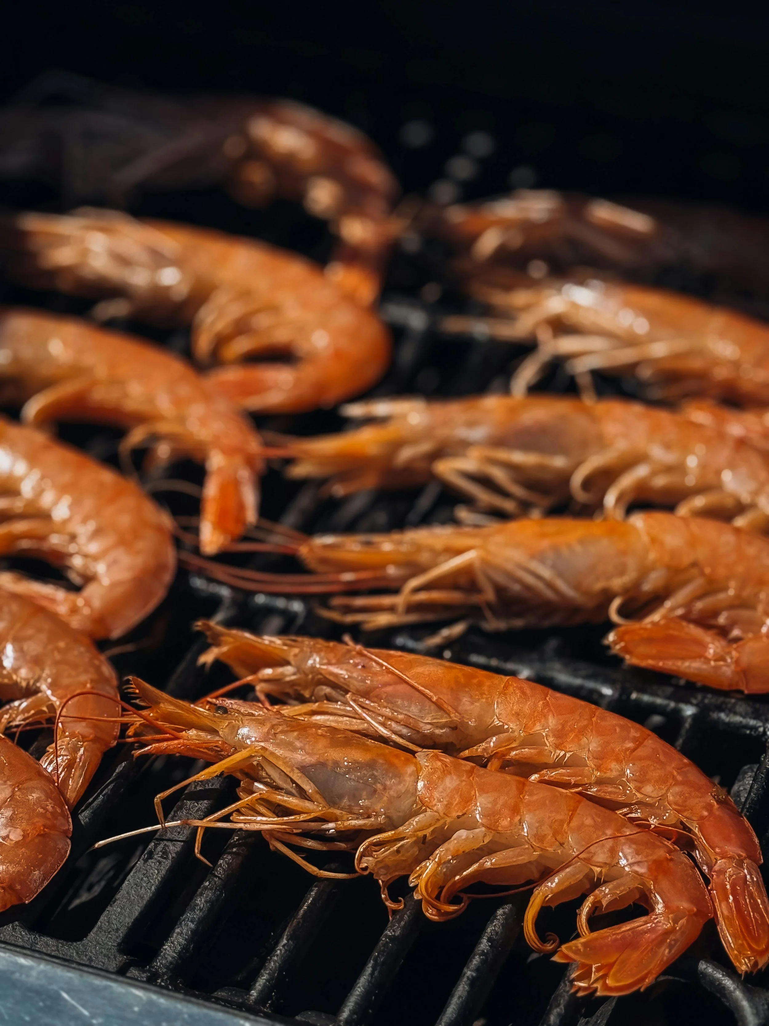 Grilling shrimp on a barbecue