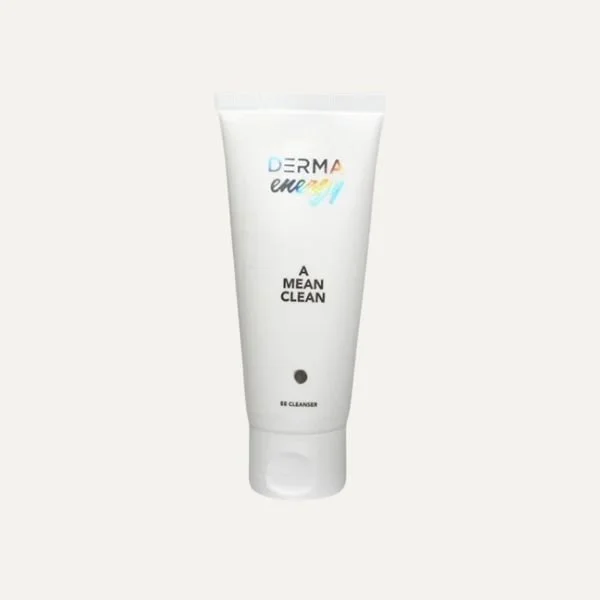 A white tube of DermA clean facial cleanser with black text and a small black dot, standing upright on a light gray background.