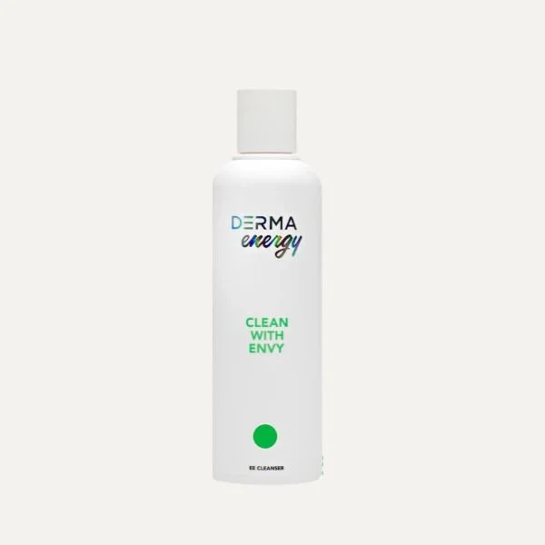 White bottle of skincare product labeled 'DERMA energy' with the tagline 'CLEAN WITH ENVY' and 'EE CLEANSER' at the bottom.