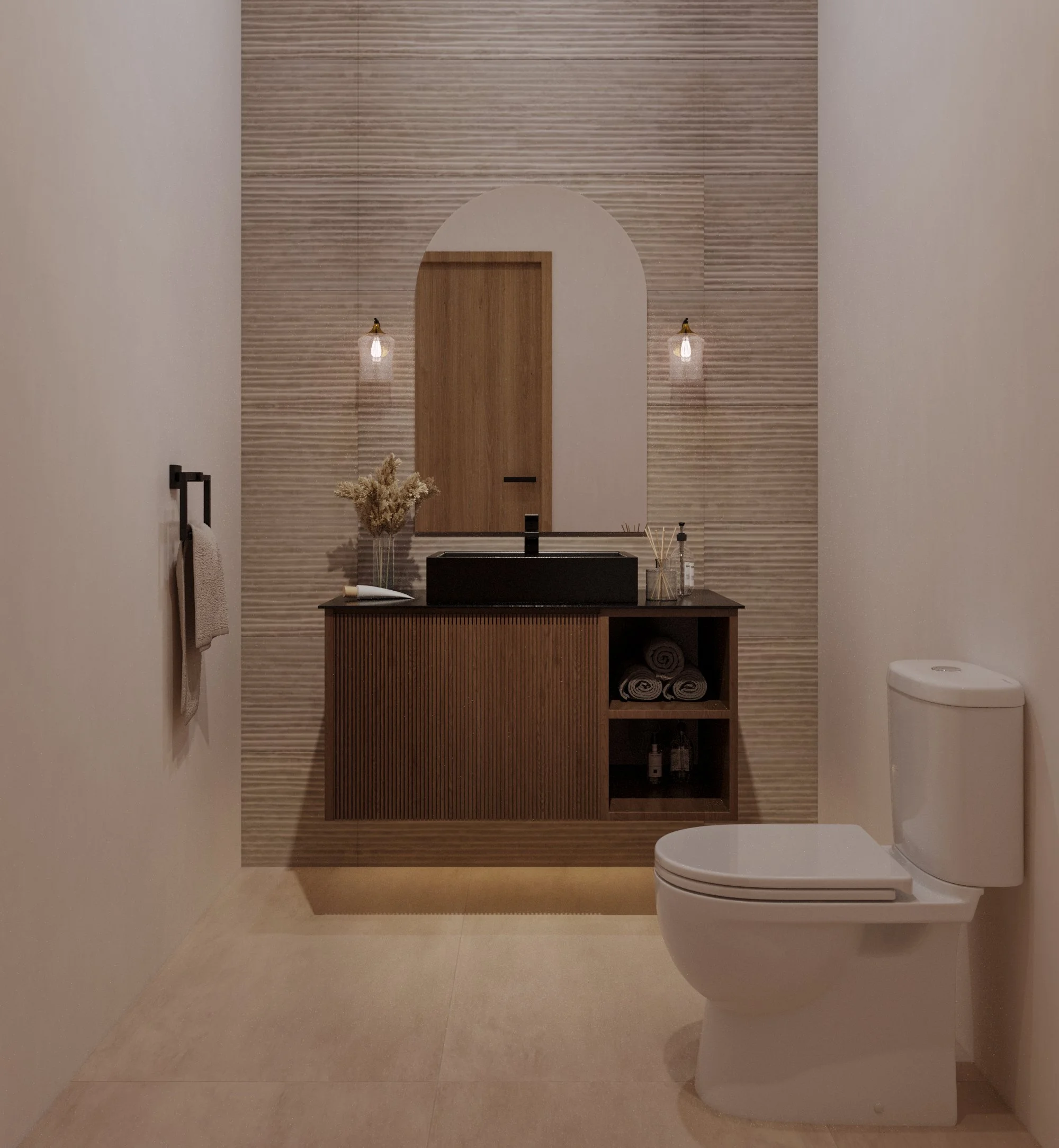 Modern bathroom with a white toilet, a black vanity with a black sink, decorative towels, a small mirror, and a textured wooden accent wall illuminated by two wall sconces.