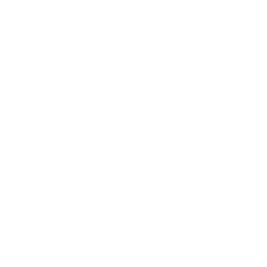 Modern building with large glass window, surrounded by mountains and wildflowers.
