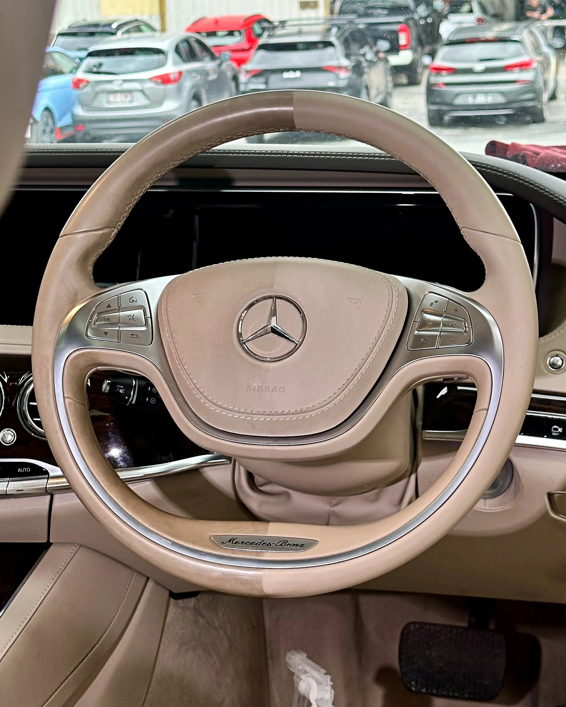 Half & half — steering wheel restored to factory finish.