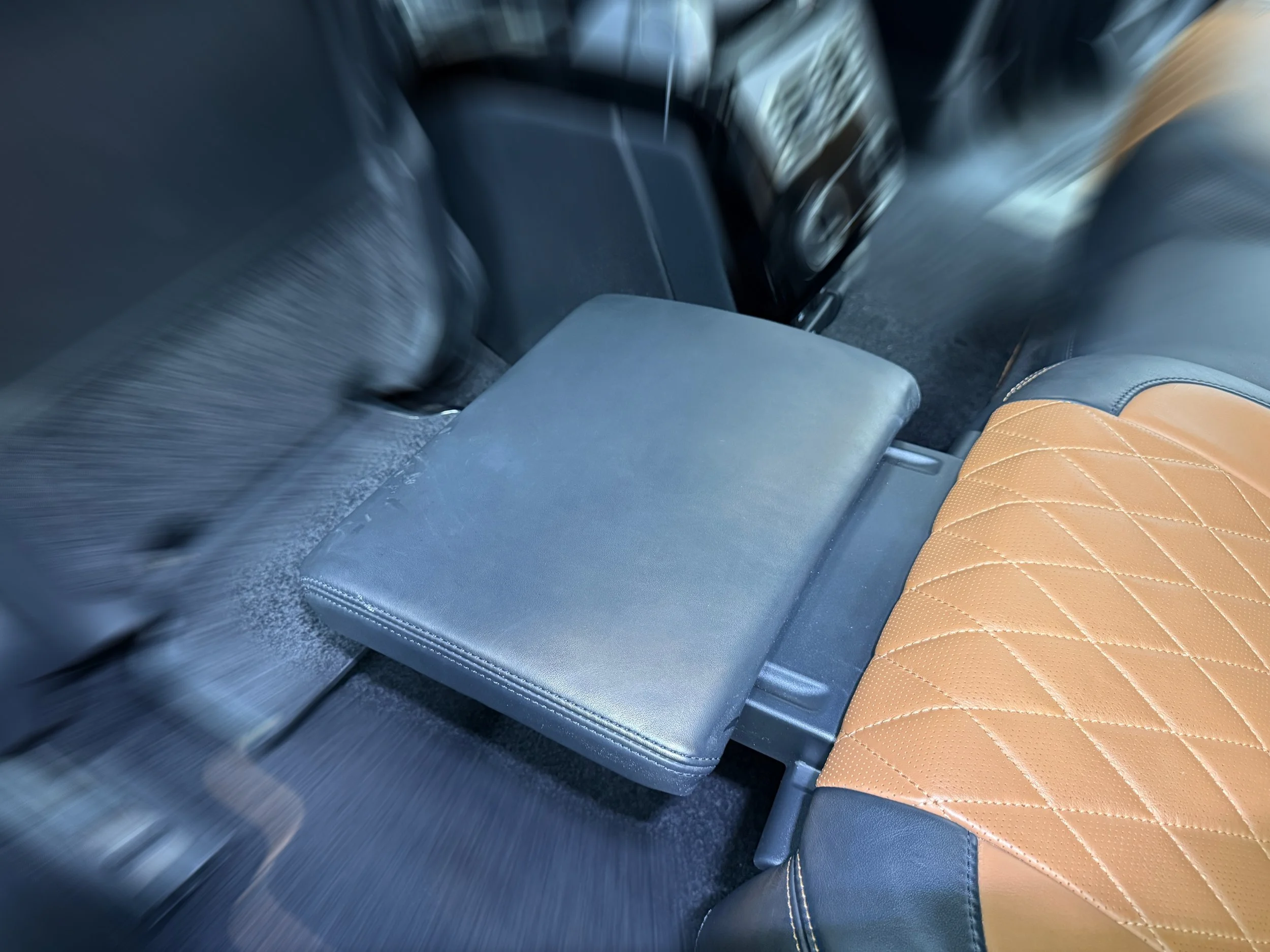 Before-and-after comparison of Range Rover leather seats following professional interior cleaning and treatment