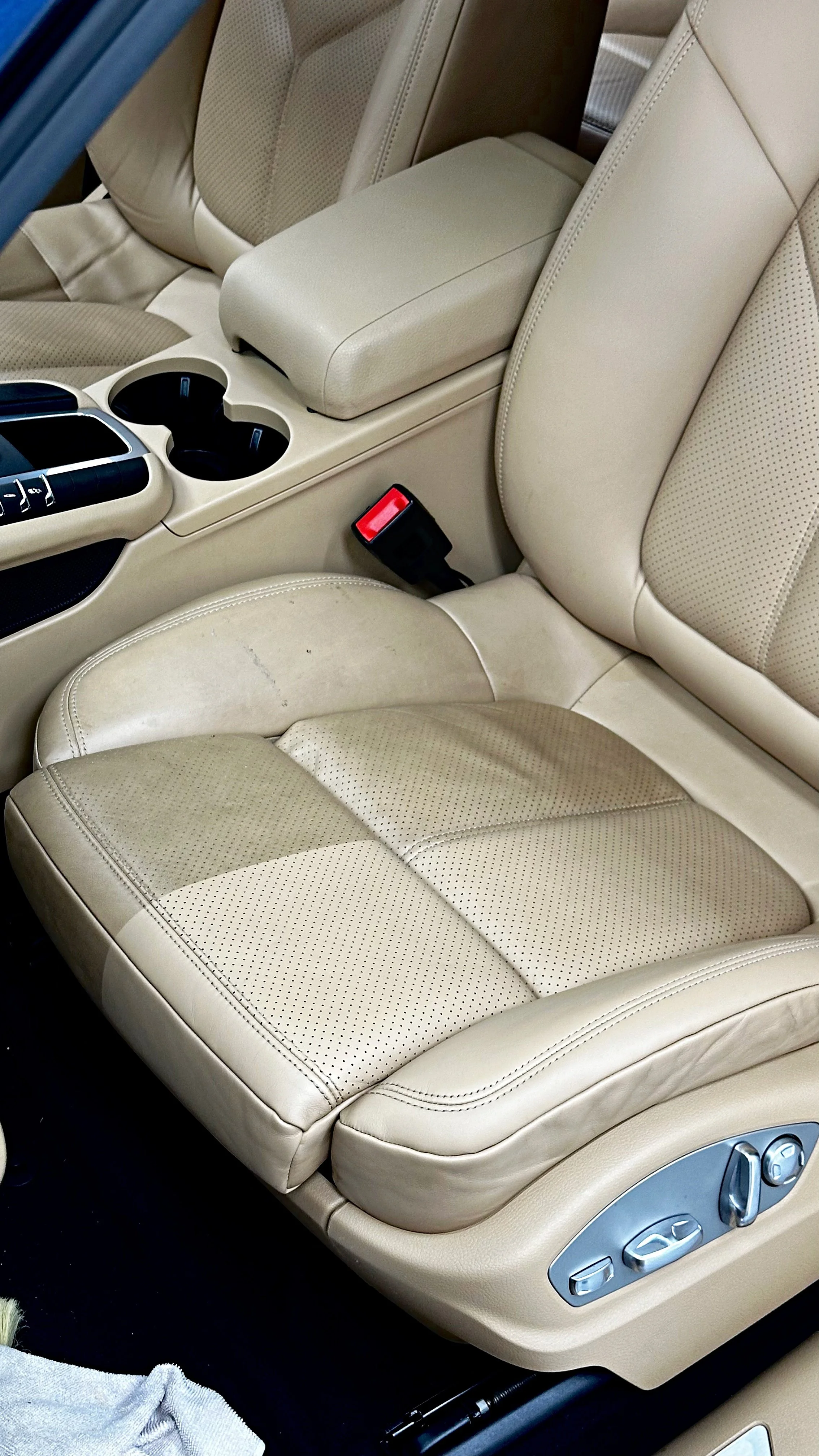 Half & half — leather restored to factory finish.