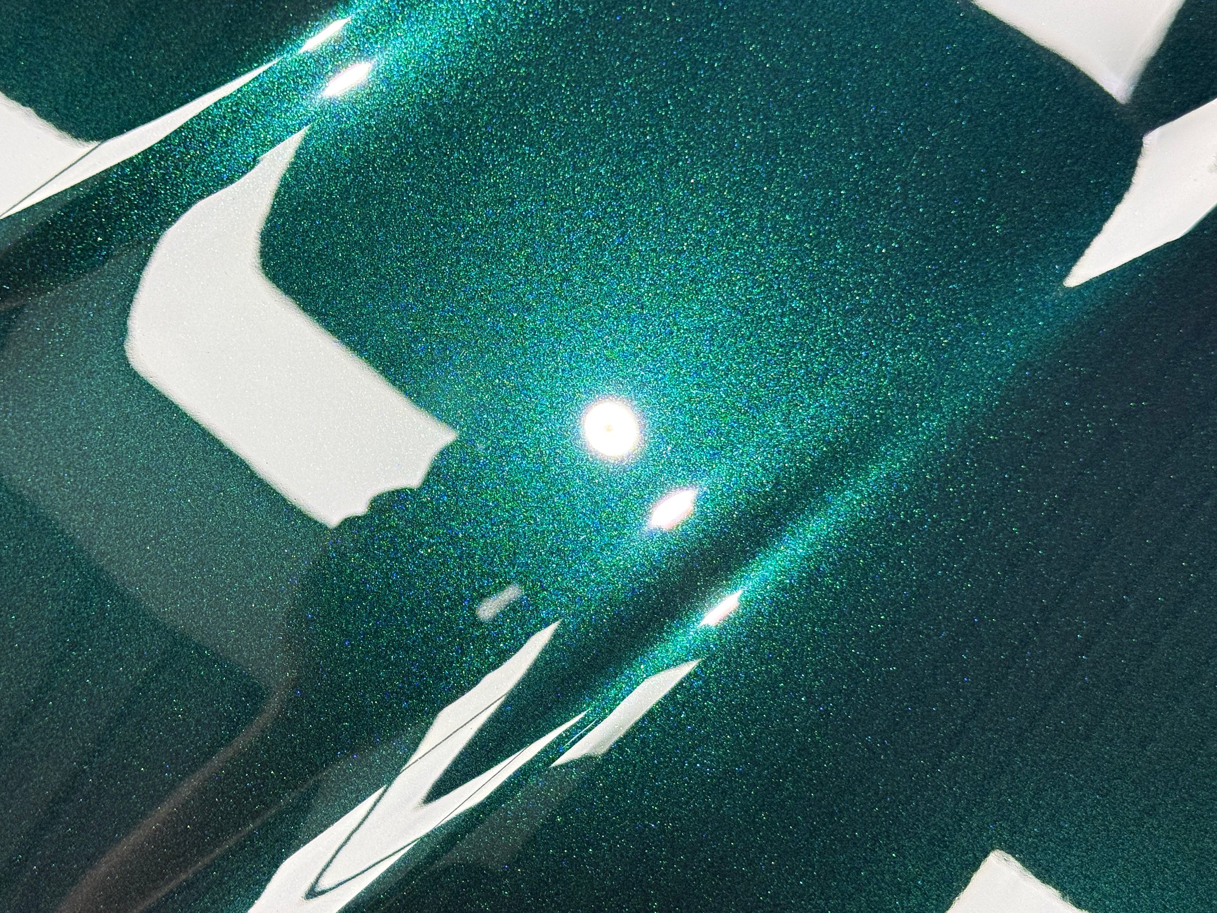 Range Rover bonnet with improved clarity and gloss after two-stage machine polishing on the Gold Coast