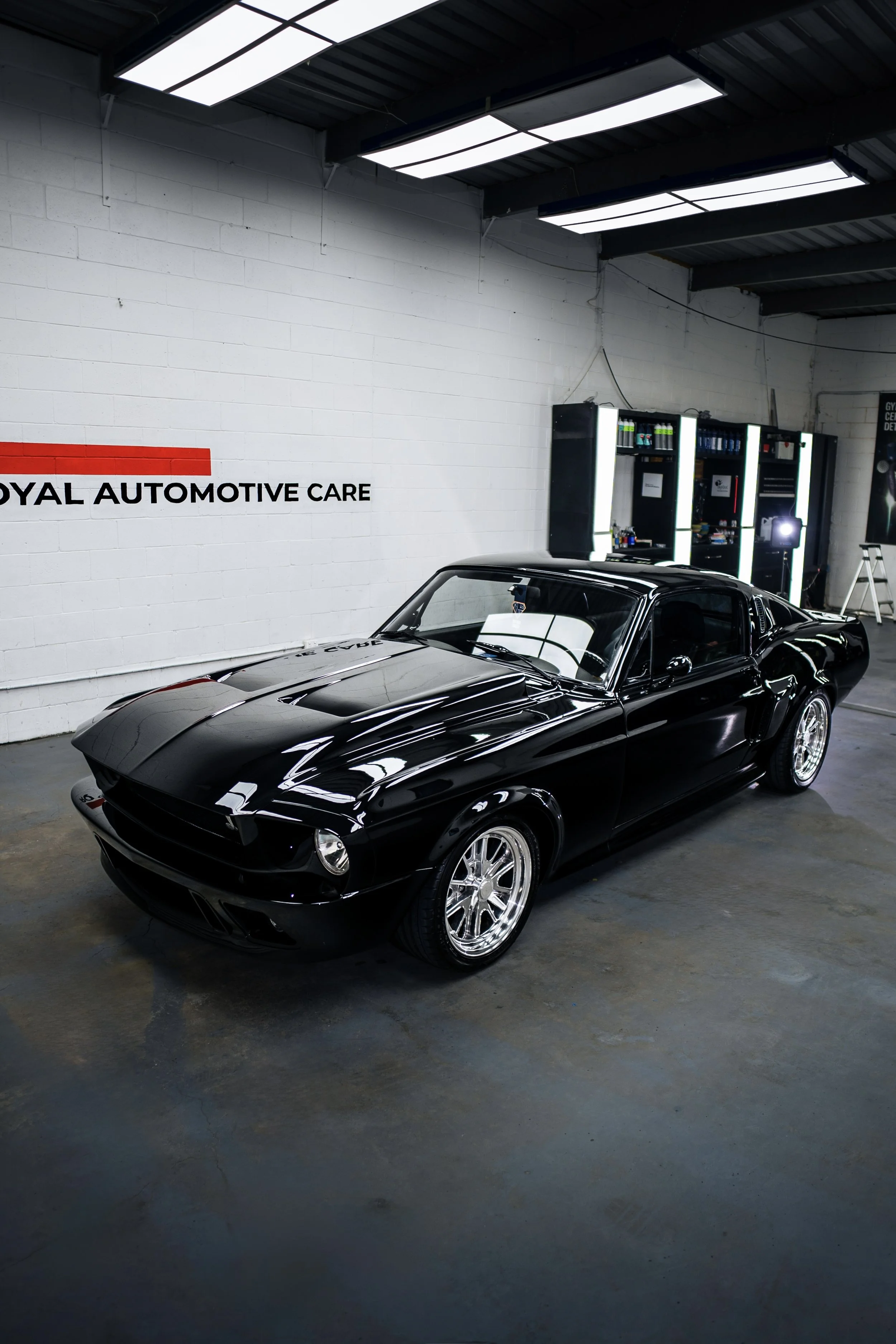 Ceramic coated 1968 ford mustang in black colour showing off the gloss and reflections