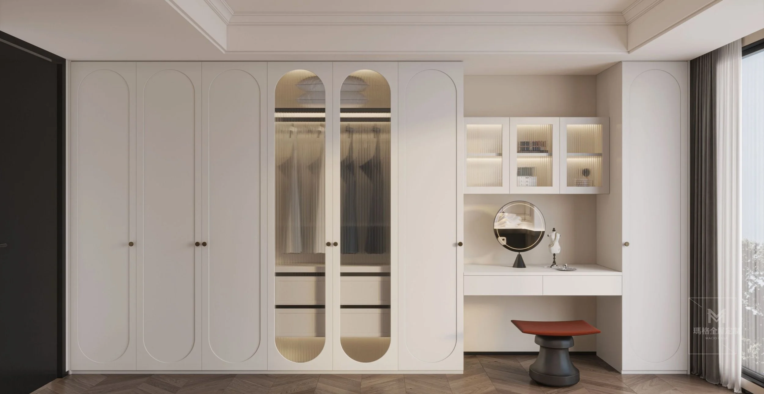 Modern white wardrobe with arched mirrors and a glass-paneled cabinet, accompanied by a dressing table with a round mirror, a mannequin, and a brown cushioned stool, near a large window with striped curtains.