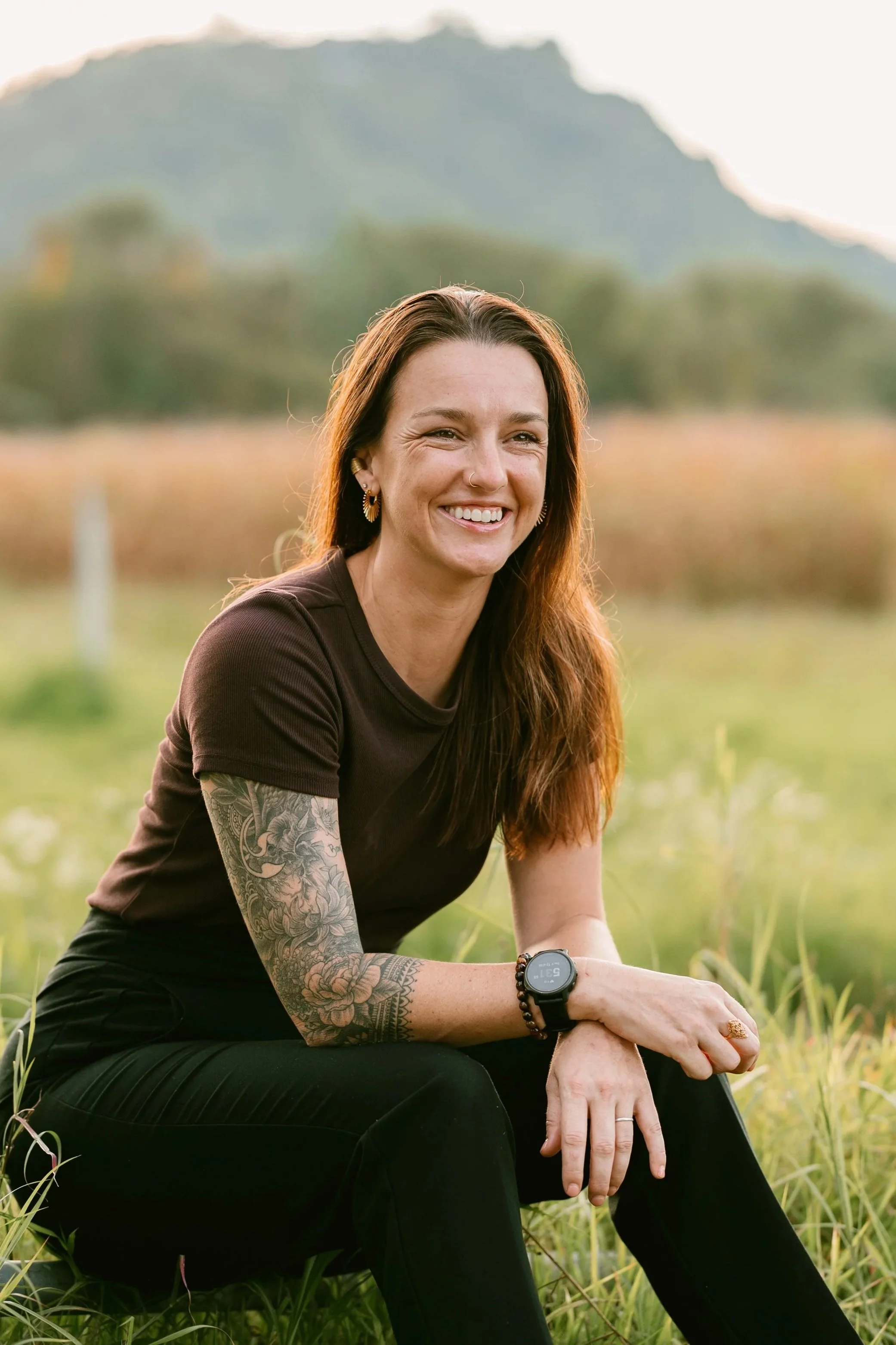 Woman enjoying the outdoors in Chiang Mai with mountains in the background