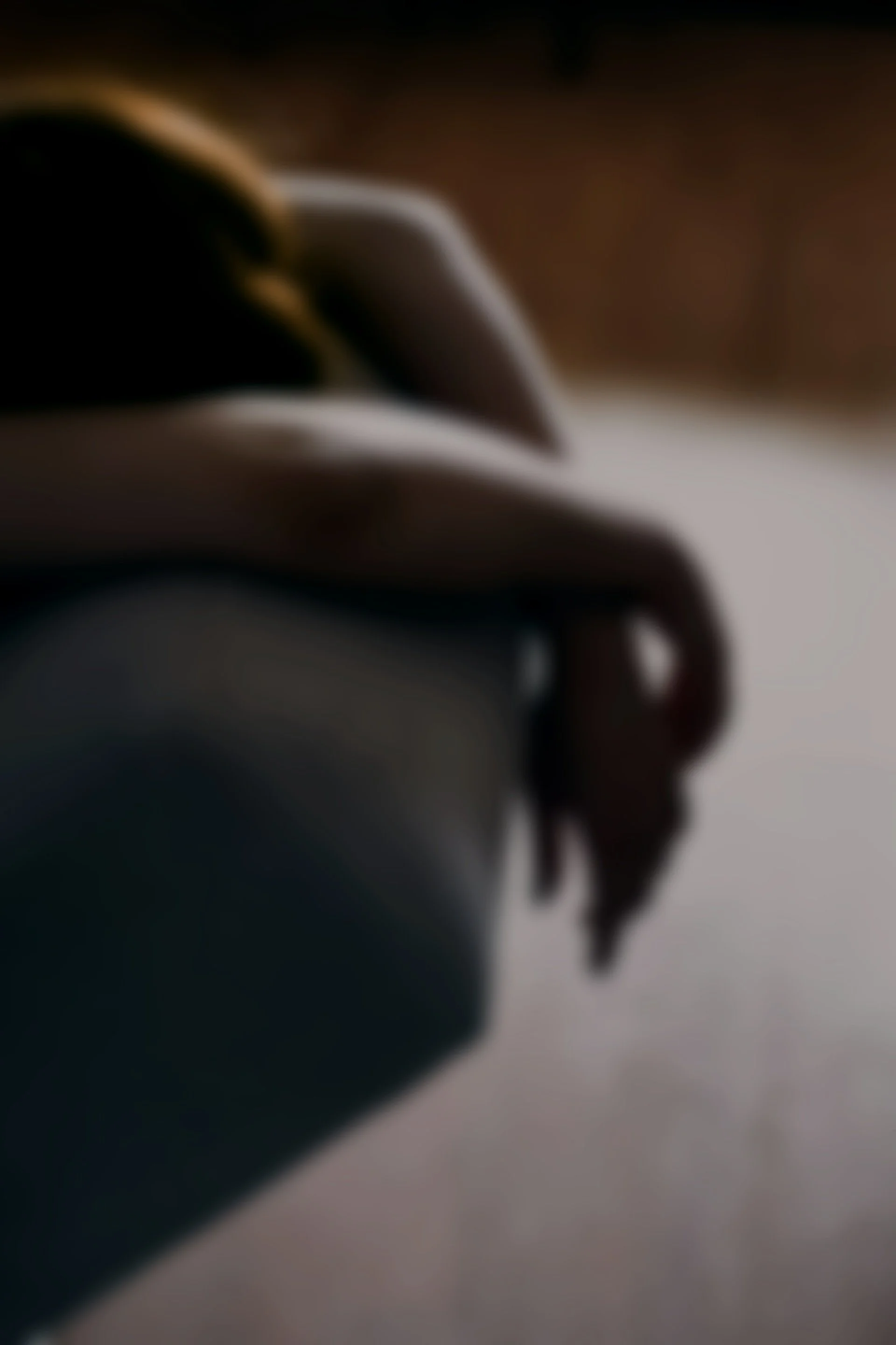 Person holding a glass of water in a calm wellness setting