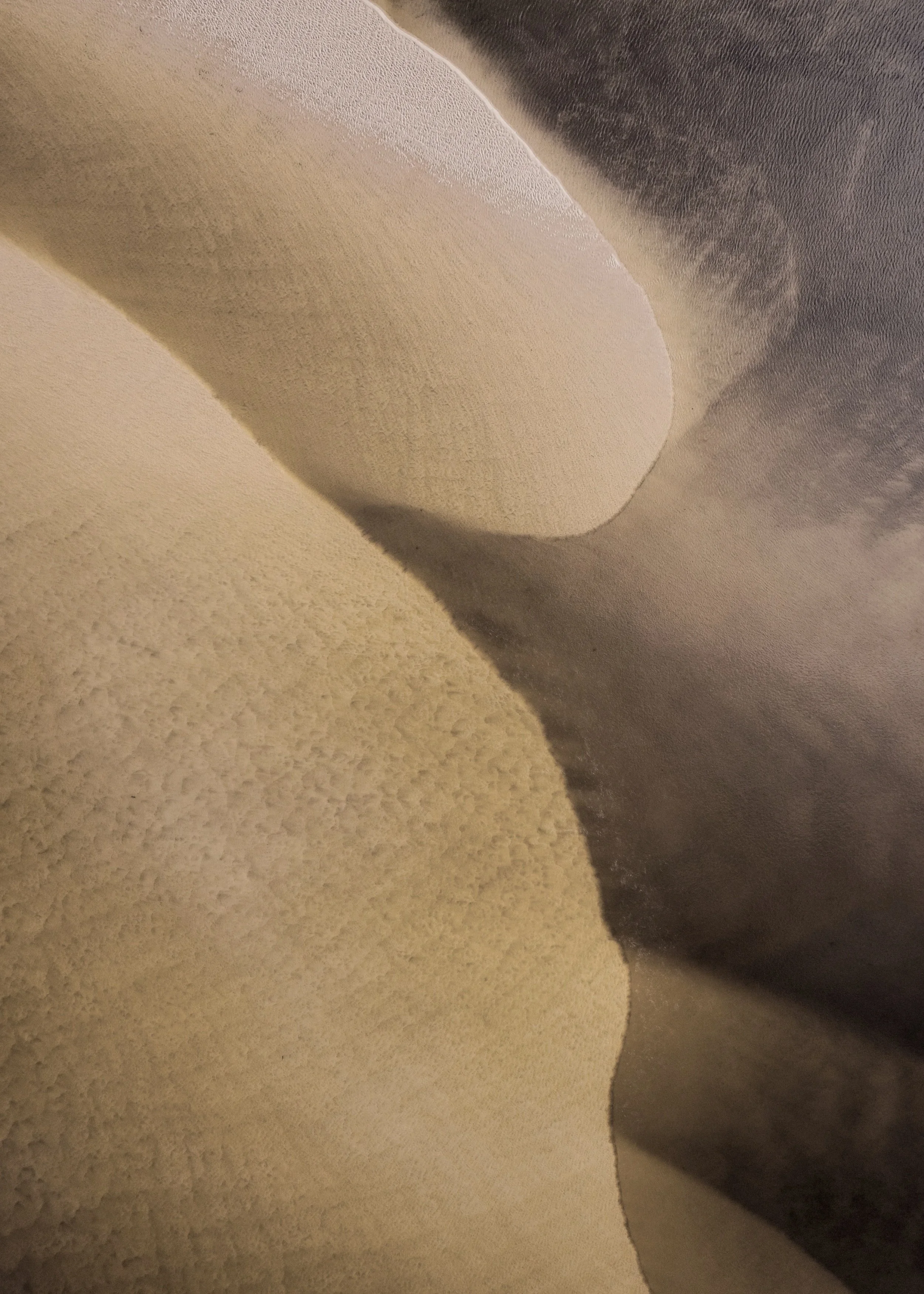 Natural textured wall with soft shadows in a neutral wellness setting