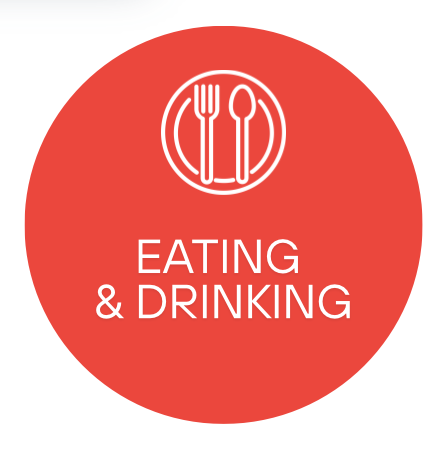 Red circular icon with white utensils and text that reads 'EATING & DRINKING'.