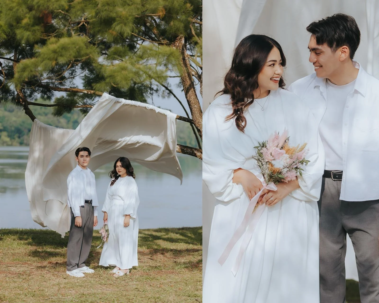 A happy couple dressed in white and gray standing outdoors near a lake, sharing an intimate moment while holding a bouquet of flowers.