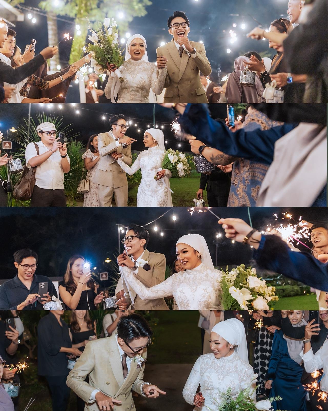 Wedding celebration with joyful guests, sparklers, and the bride and groom in formal attire at night.