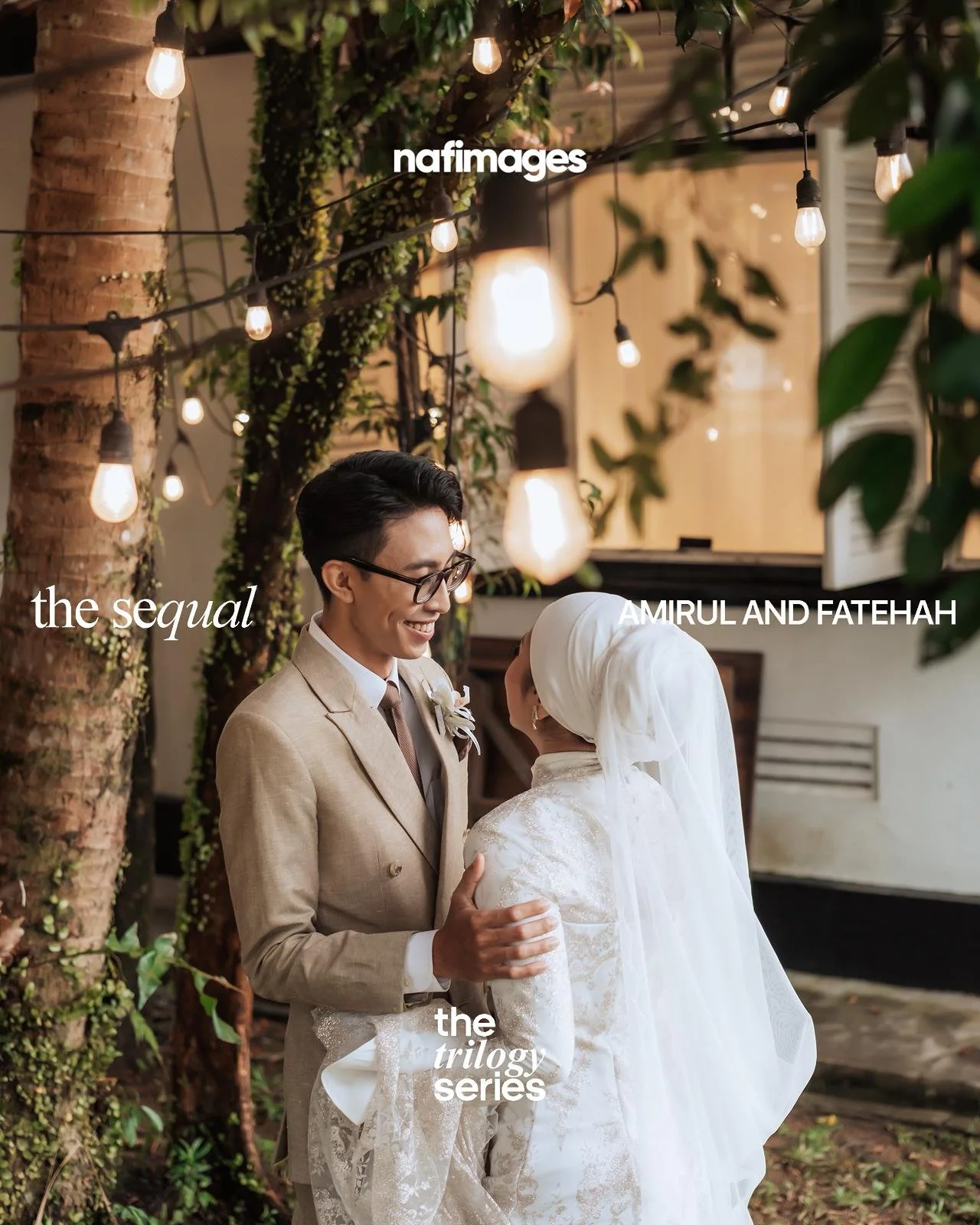 A bride and groom smiling and holding each other outdoors at night, surrounded by string lights and greenery.