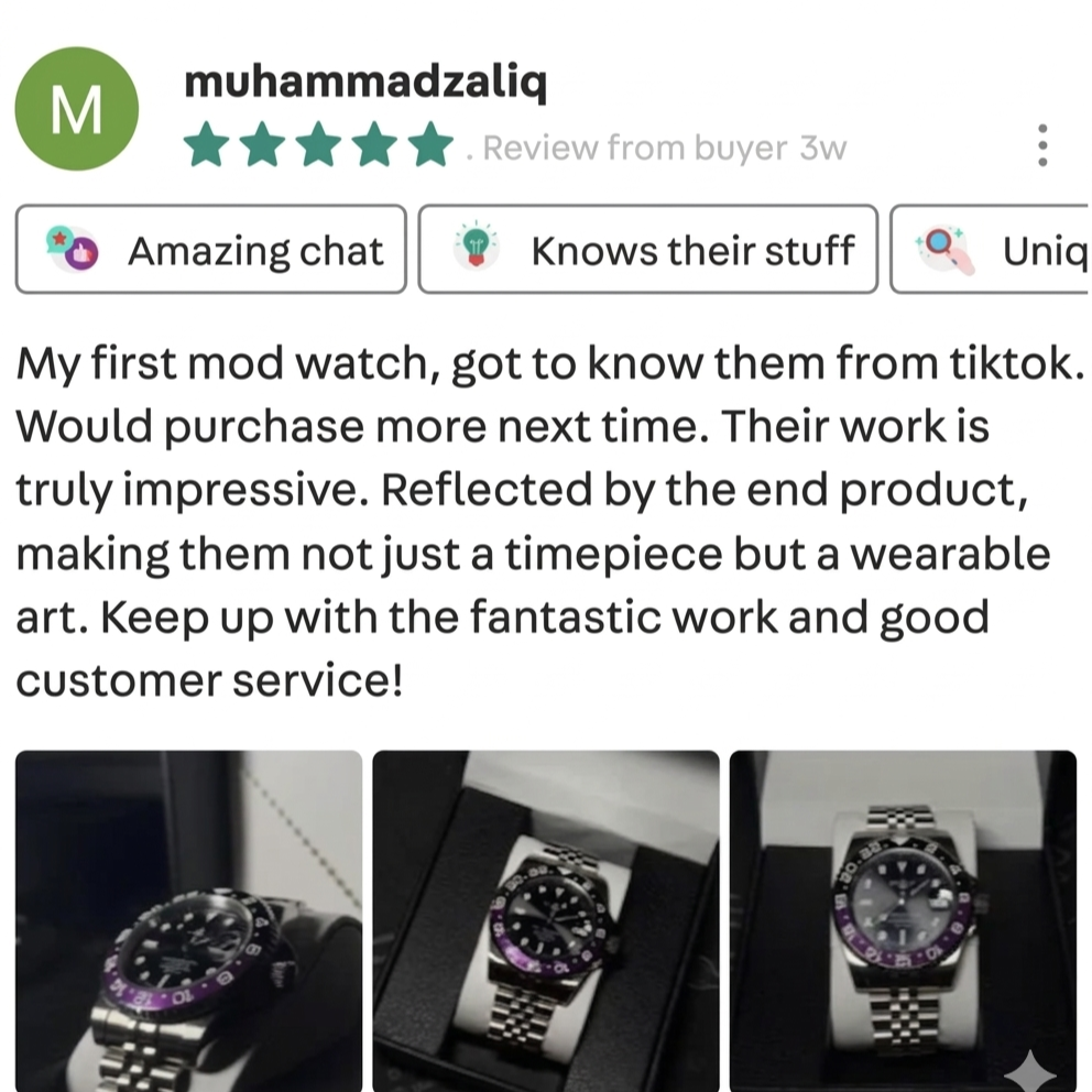 Three images of a modern wristwatch with a black and purple bezel, stainless steel band, and black dial, displayed on a white background and in a black presentation box.