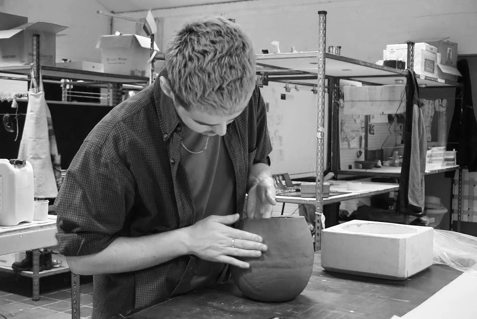 Me working in the studio building a sample piece using earthenware clay.