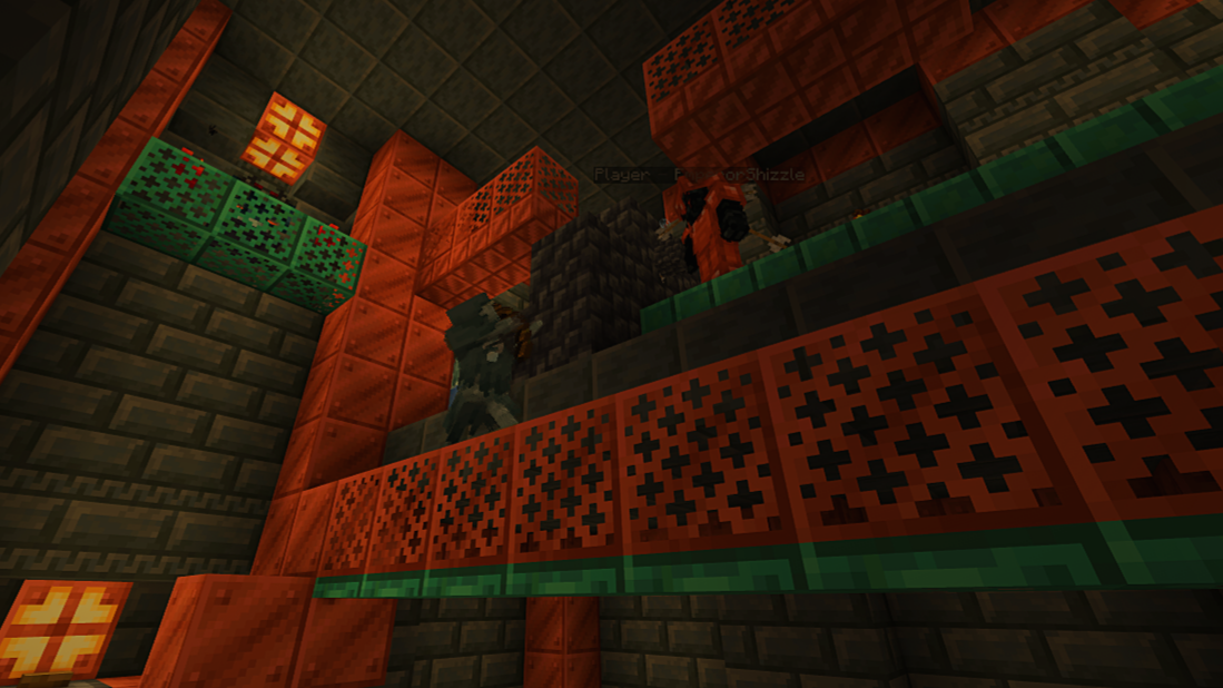 Minecraft game scene with players on a lava stone platform surrounded by red and green blocks.