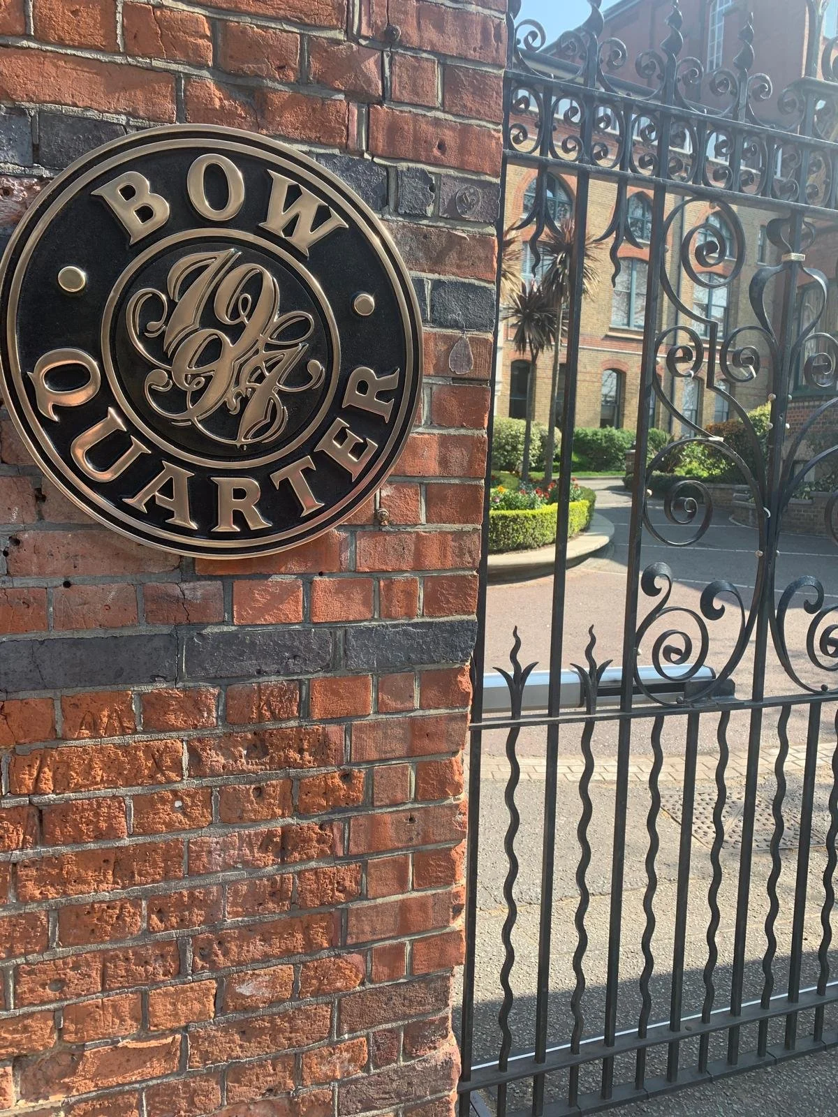 Bow Quarter logo on front entrance gate