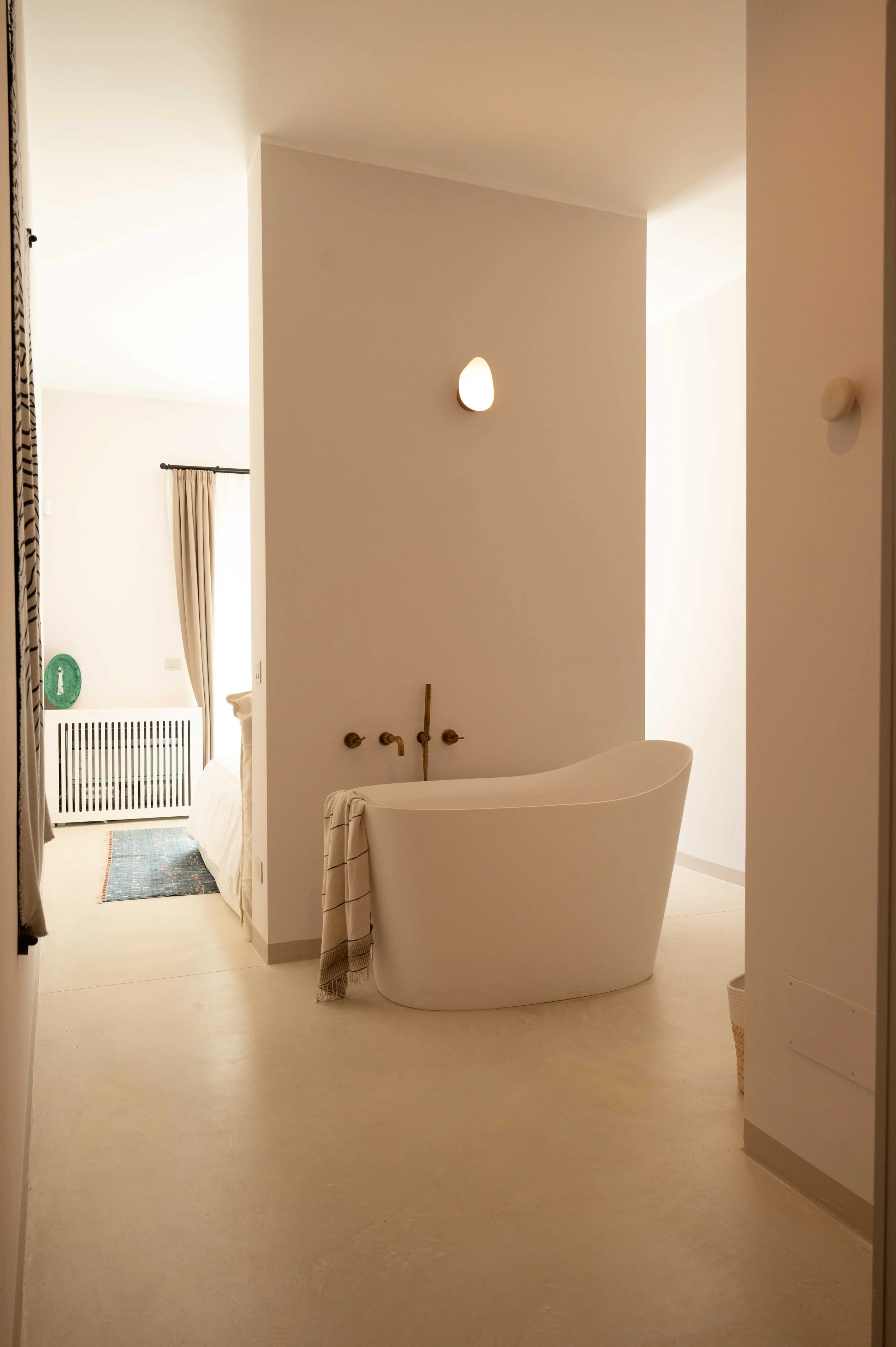 Bathroom with freestanding tub at Masseria Coucou