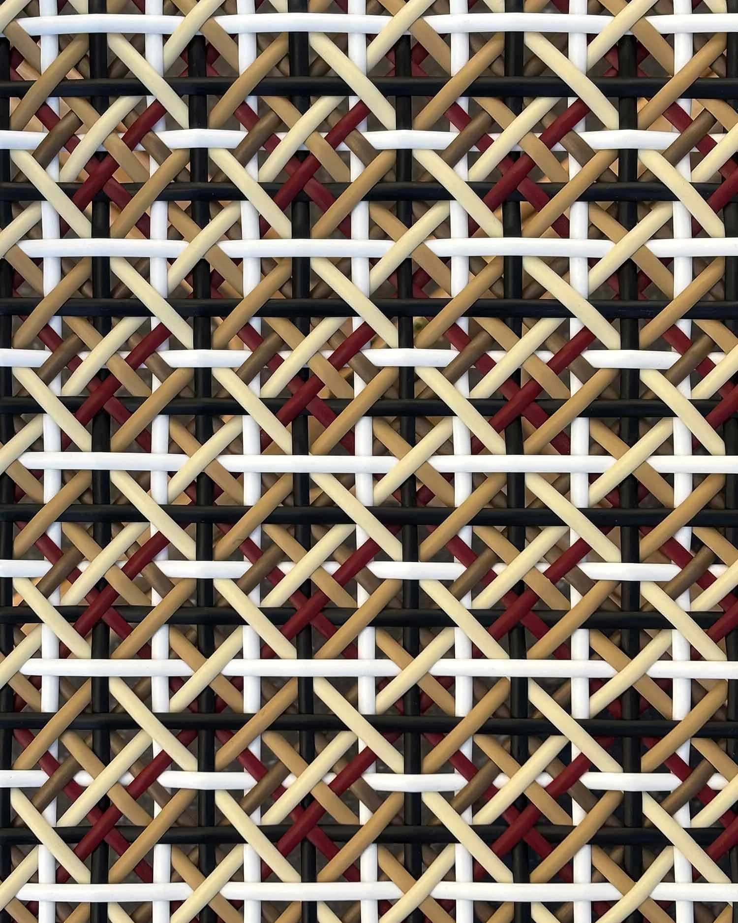 details of the Valmy rattan chair's seat weaving