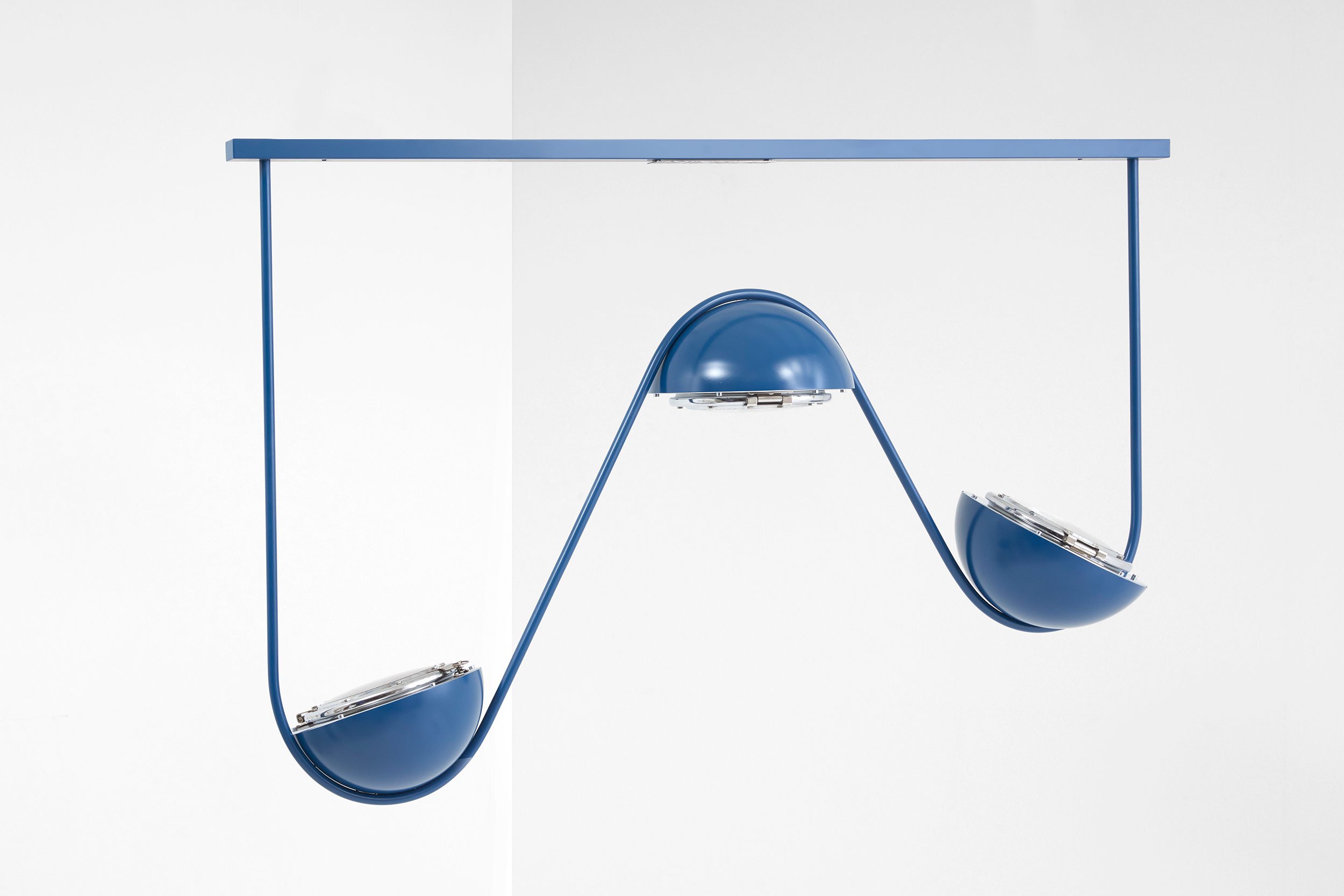 Pendant light made of old train lamps