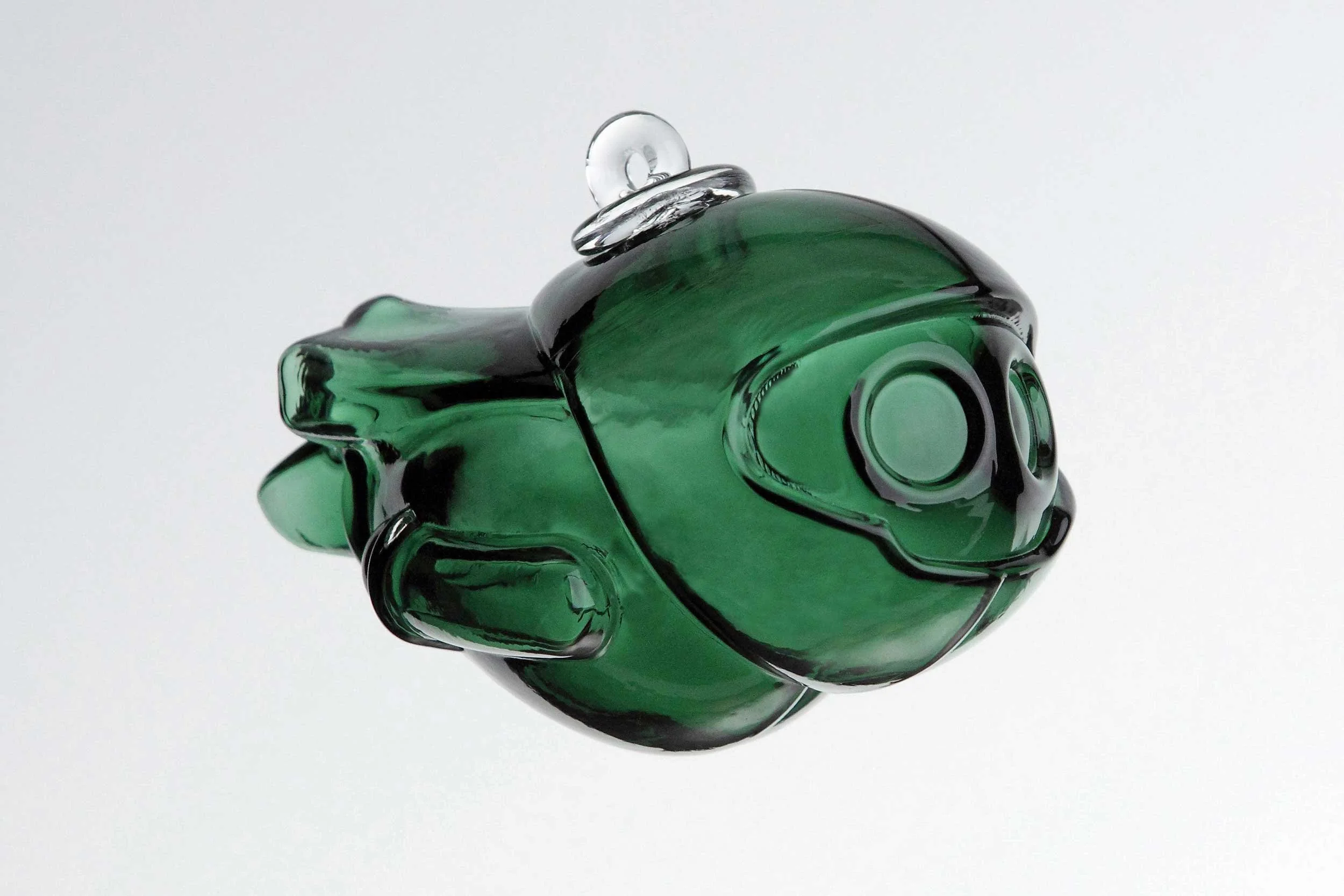 the mountains super-hero blown glass ornament in green glass