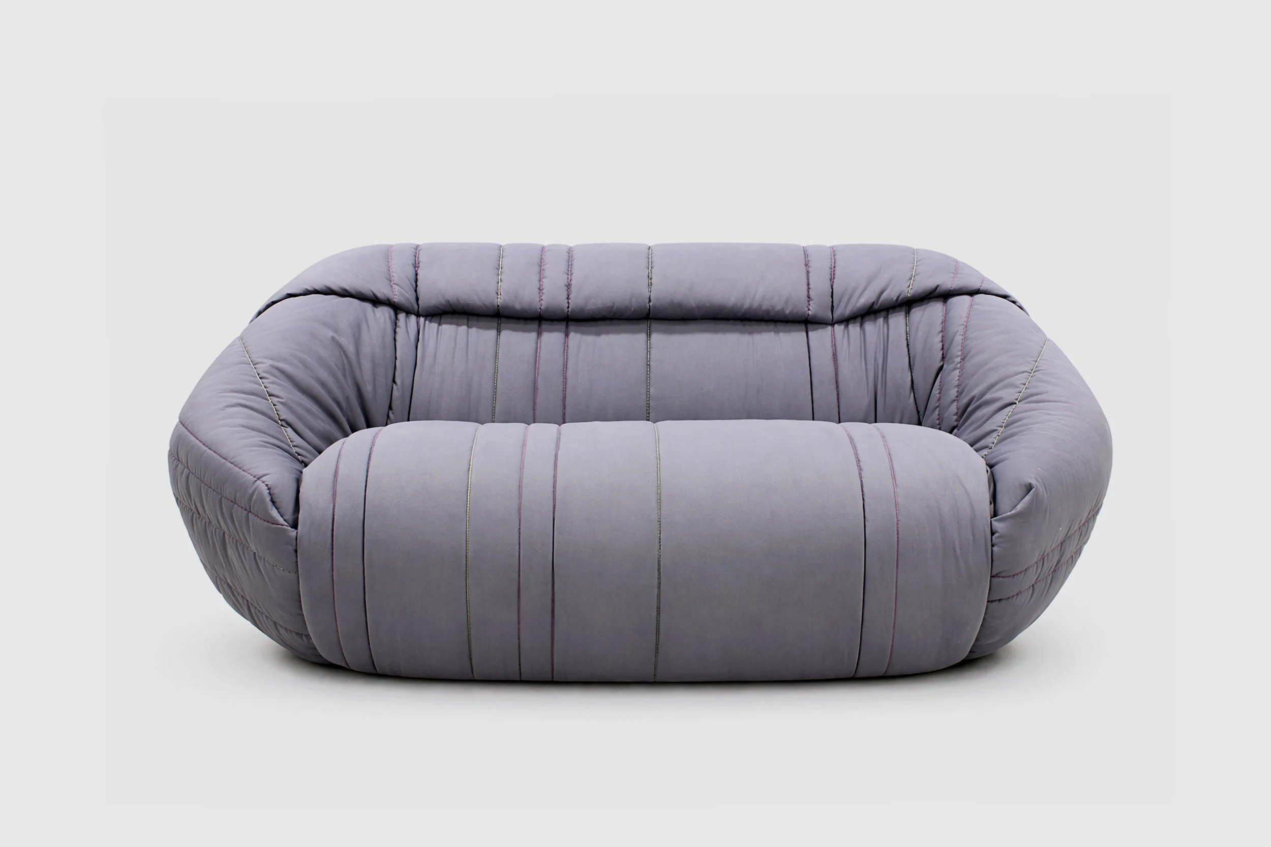 Sofa made of a large folded quilt
