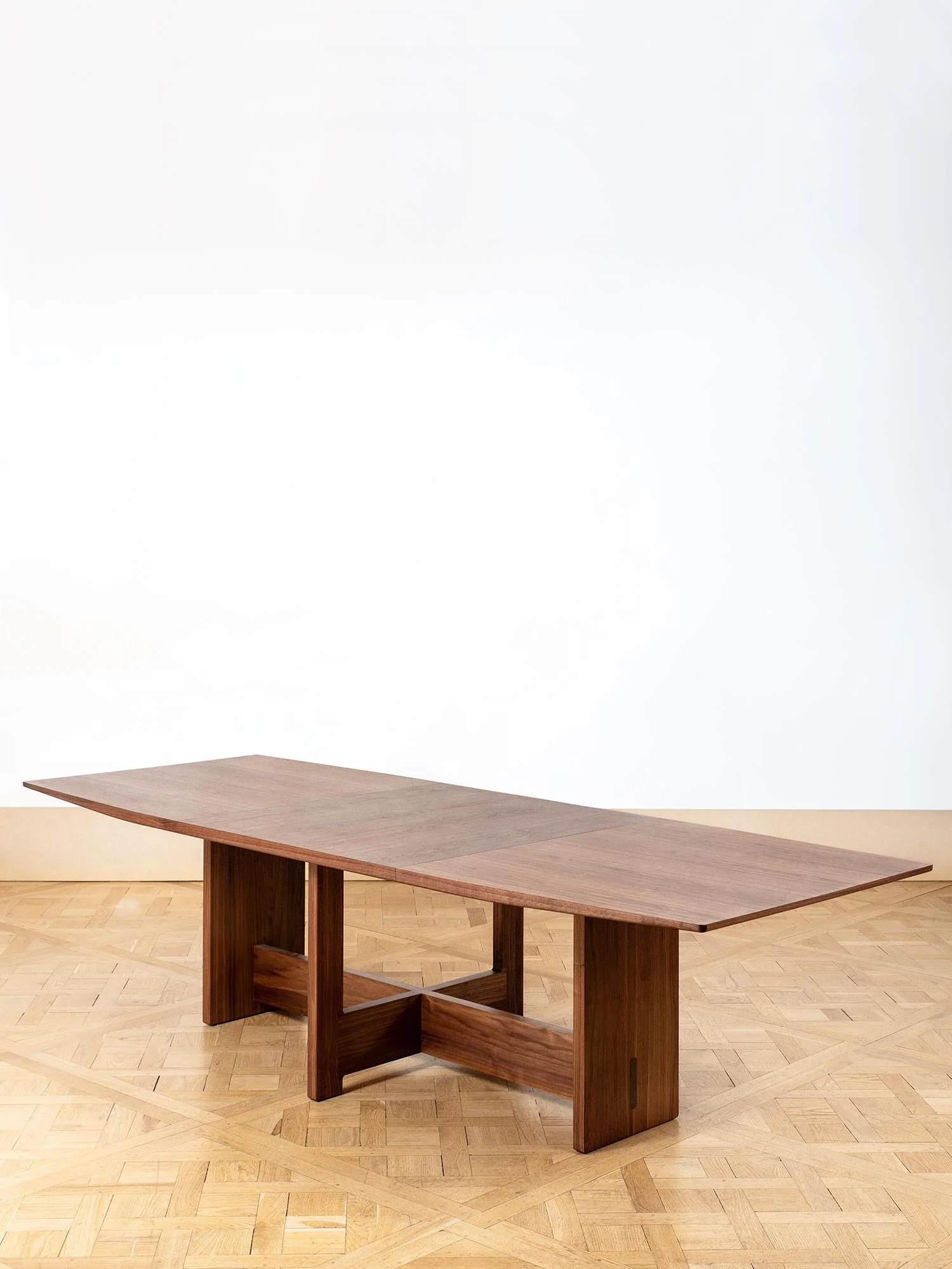 Wooden dining table made with solid walnut