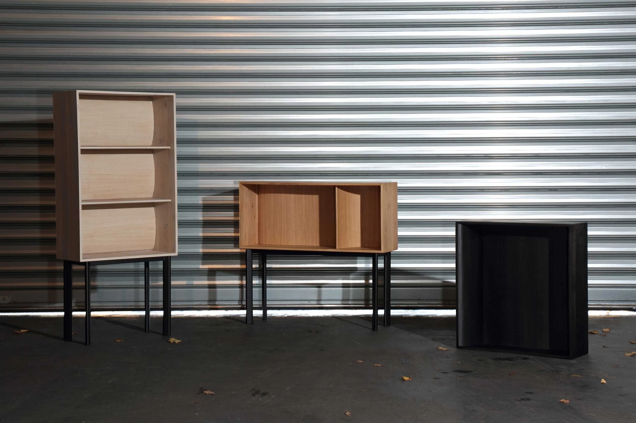 high, low and wall cabinets with a curved backpart