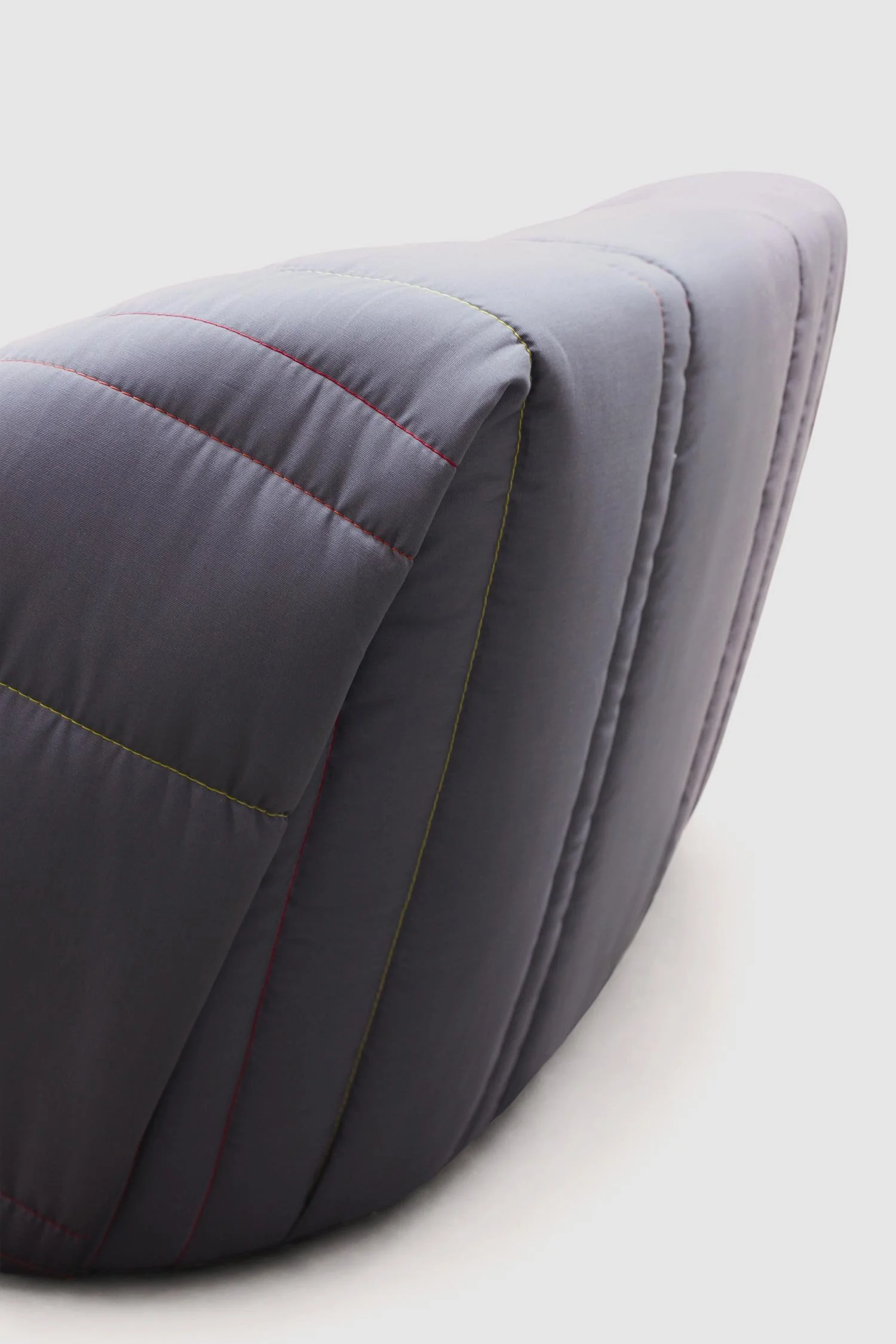 Sofa made of a large folded quilt