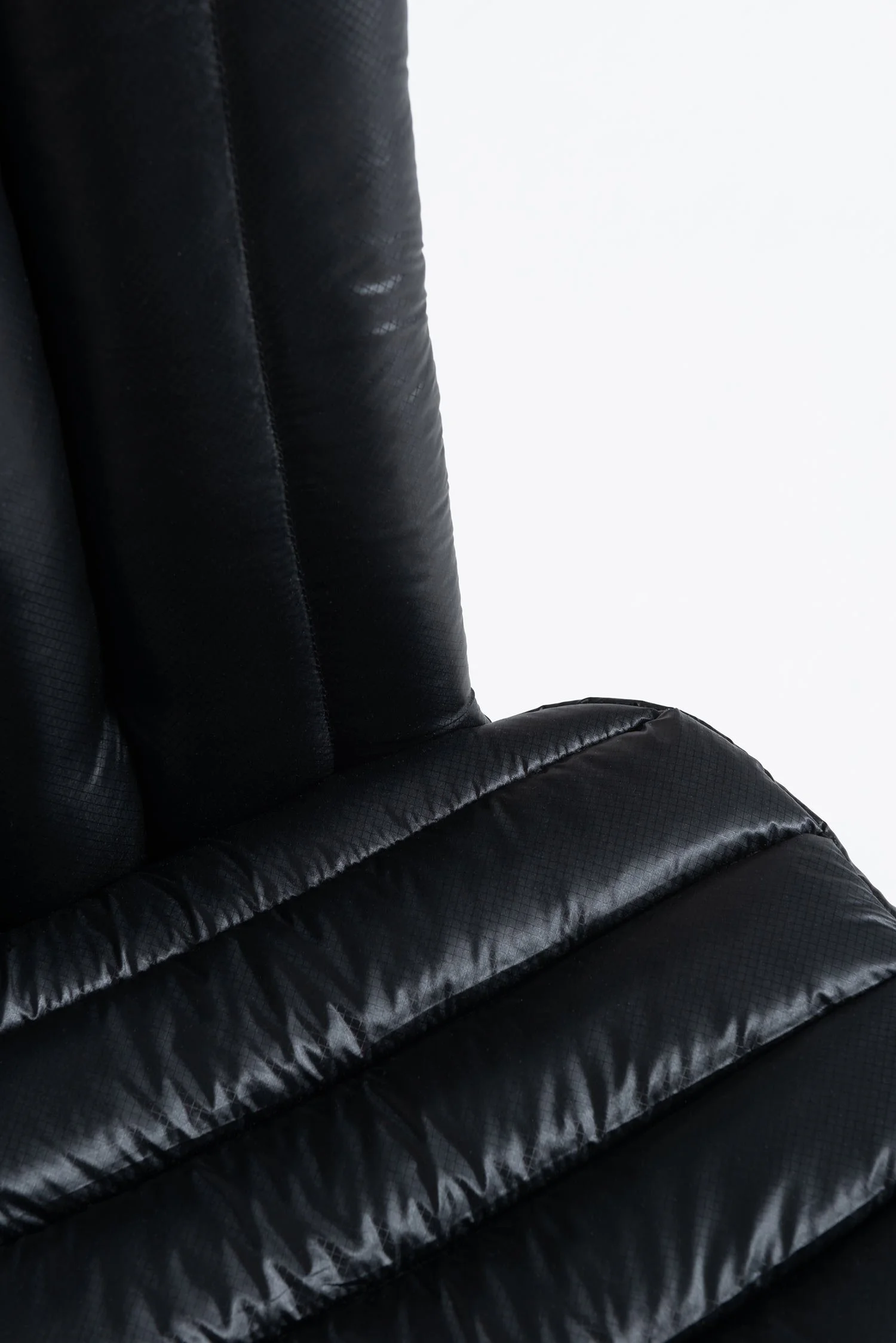 Details of the puffer jacket suit