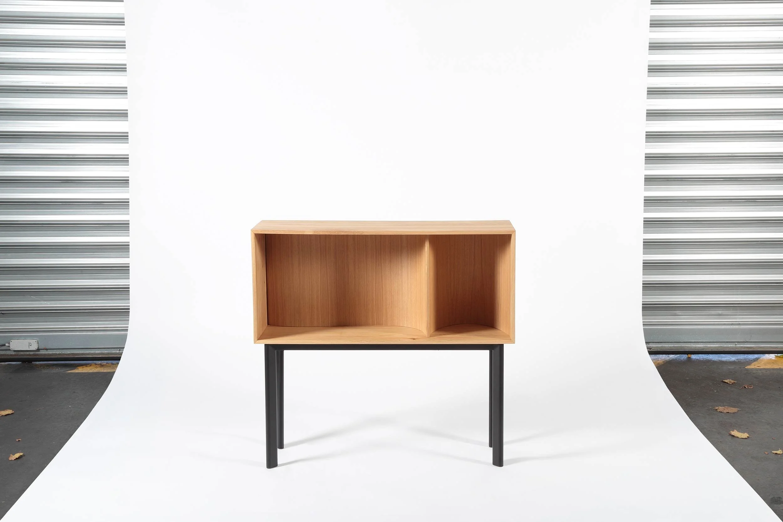 low cabinet with a curved backpart