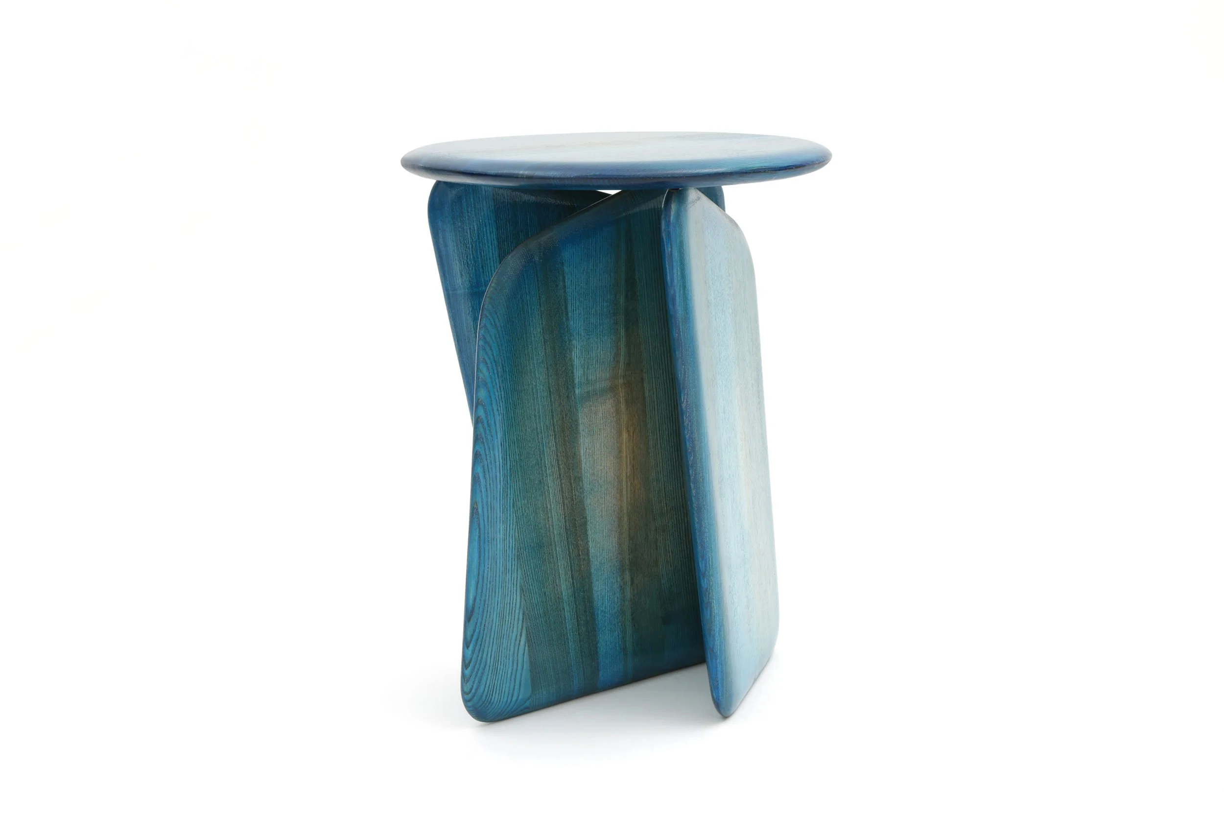 Vent contraire side table with a blue sunburst