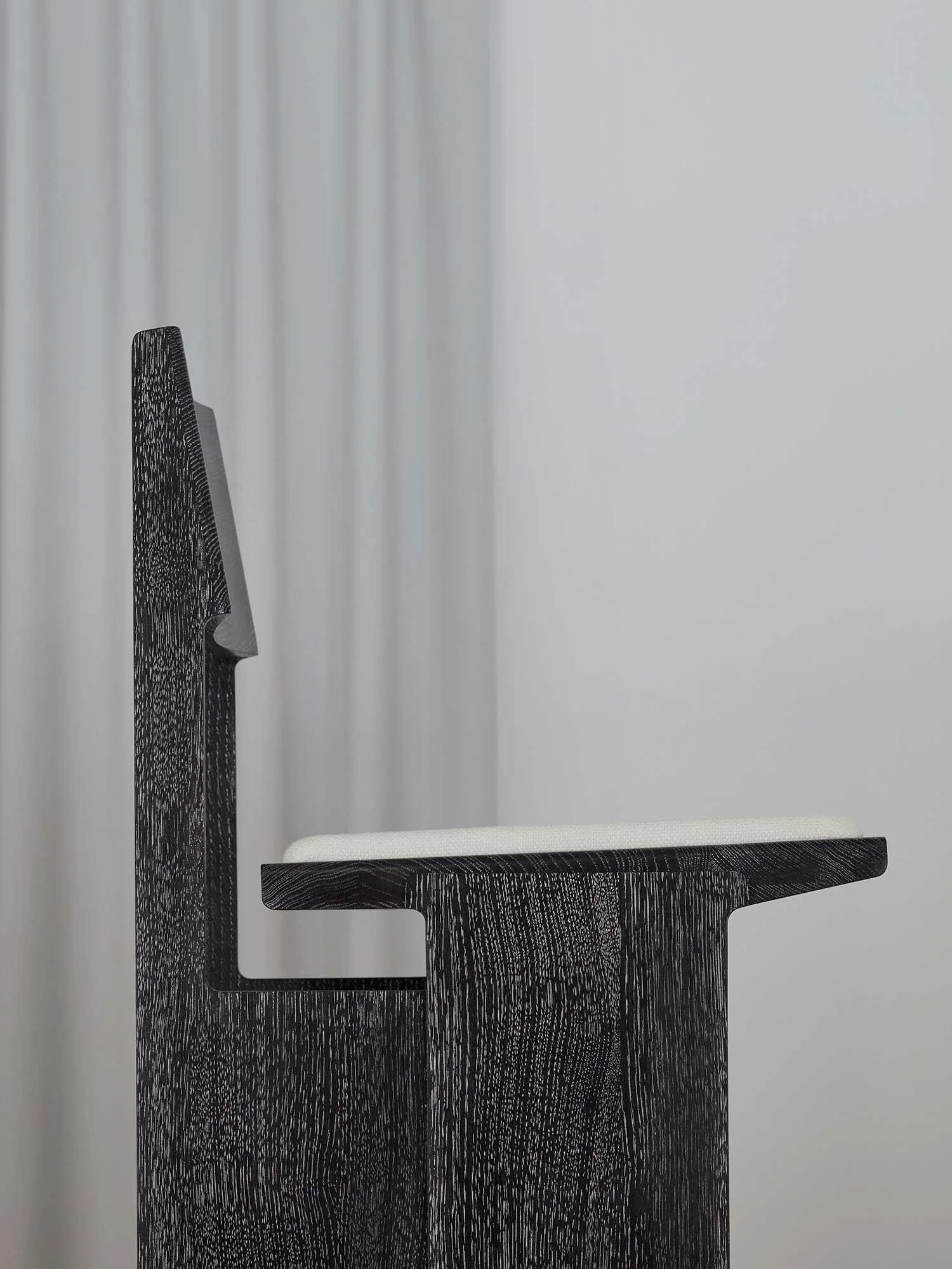 Black cerused oak chair side view