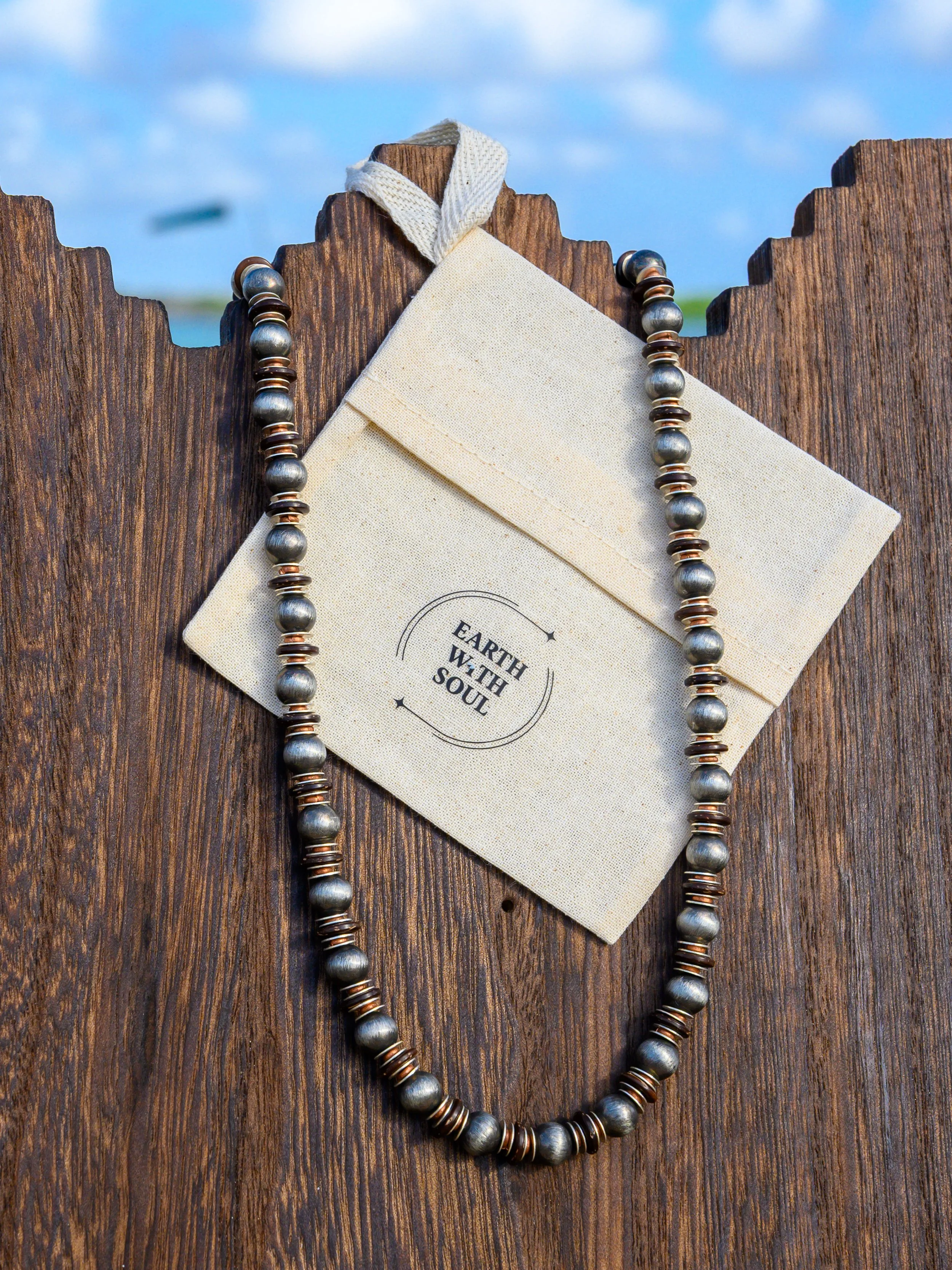 NR. 20 
Navajo Pearl*Silver and Brass Heshi Spacer discs