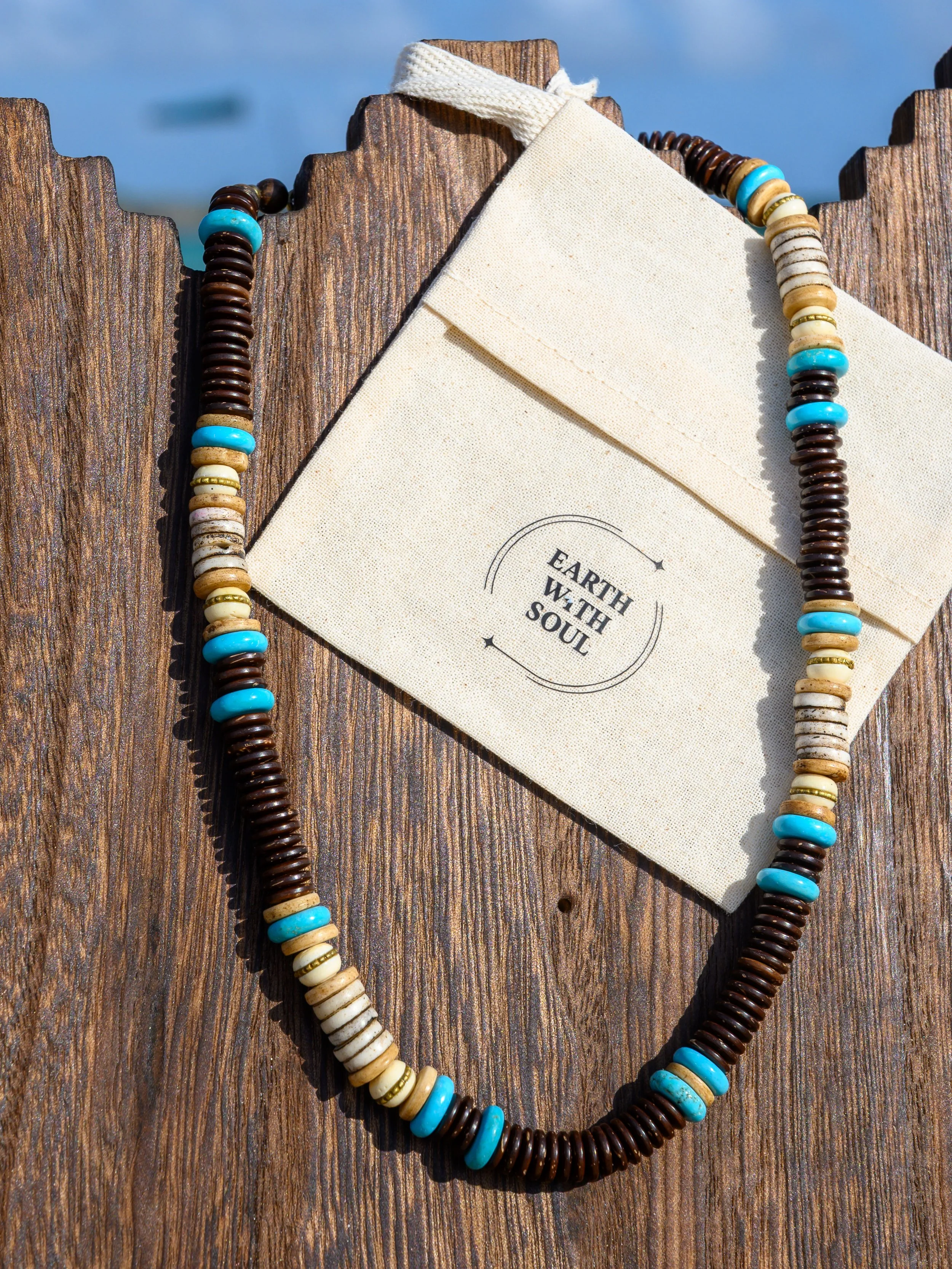 NR. 28 
Brown and White Bone*Blue Turquoise Heshi Disks