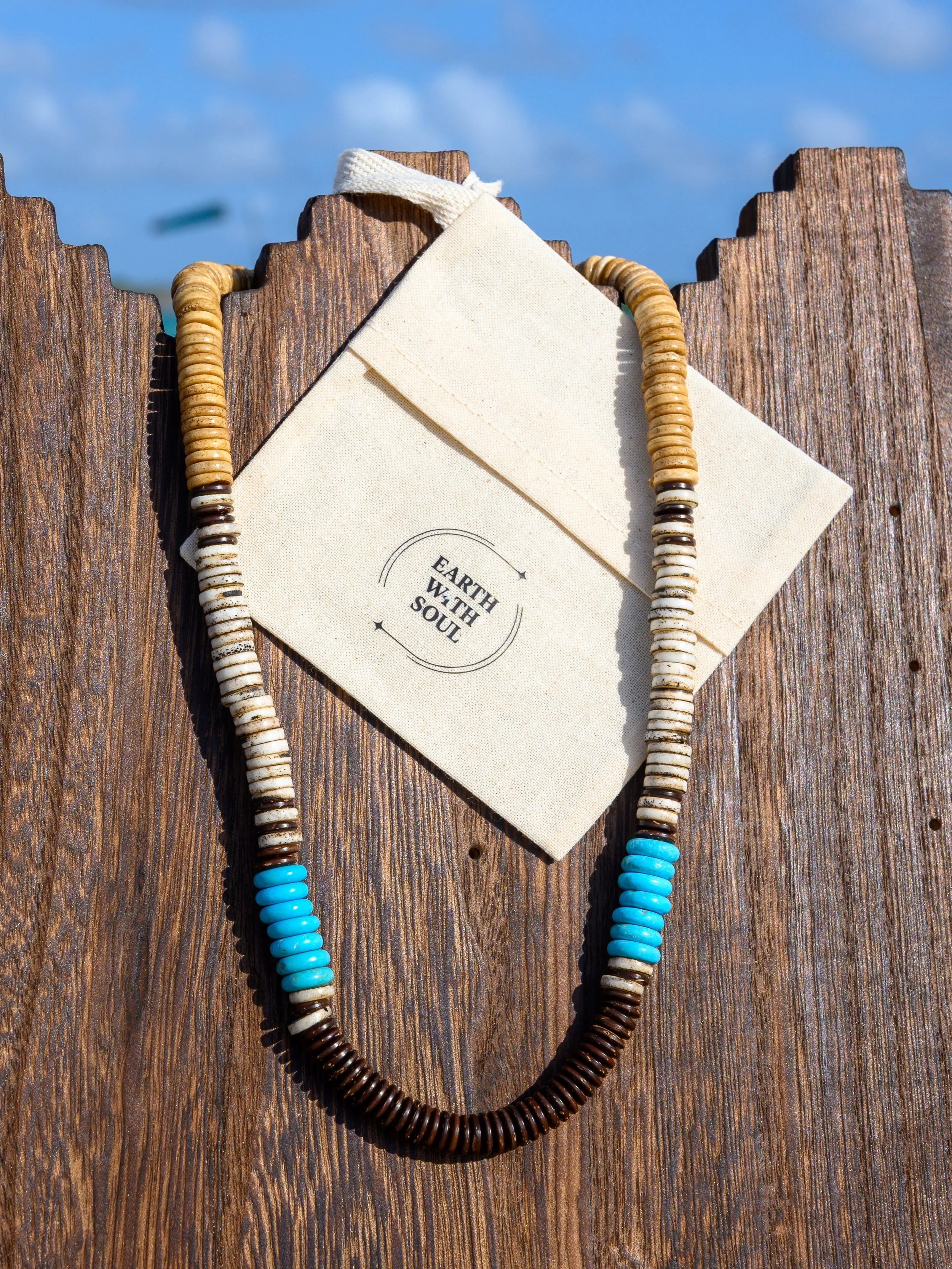 NR. 31 
Brown and White Bone Heshi Disks* Blue Turquoise Heshi Disks