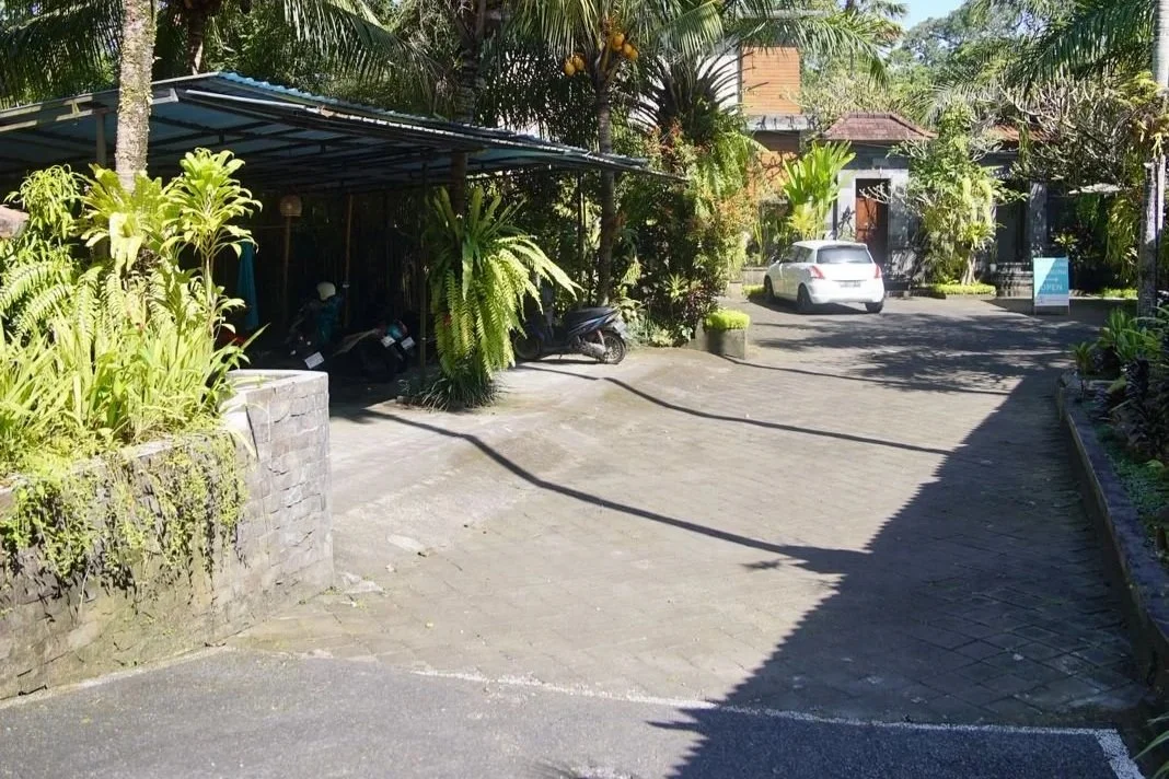 Plenty of parking for cars, scooters and buses